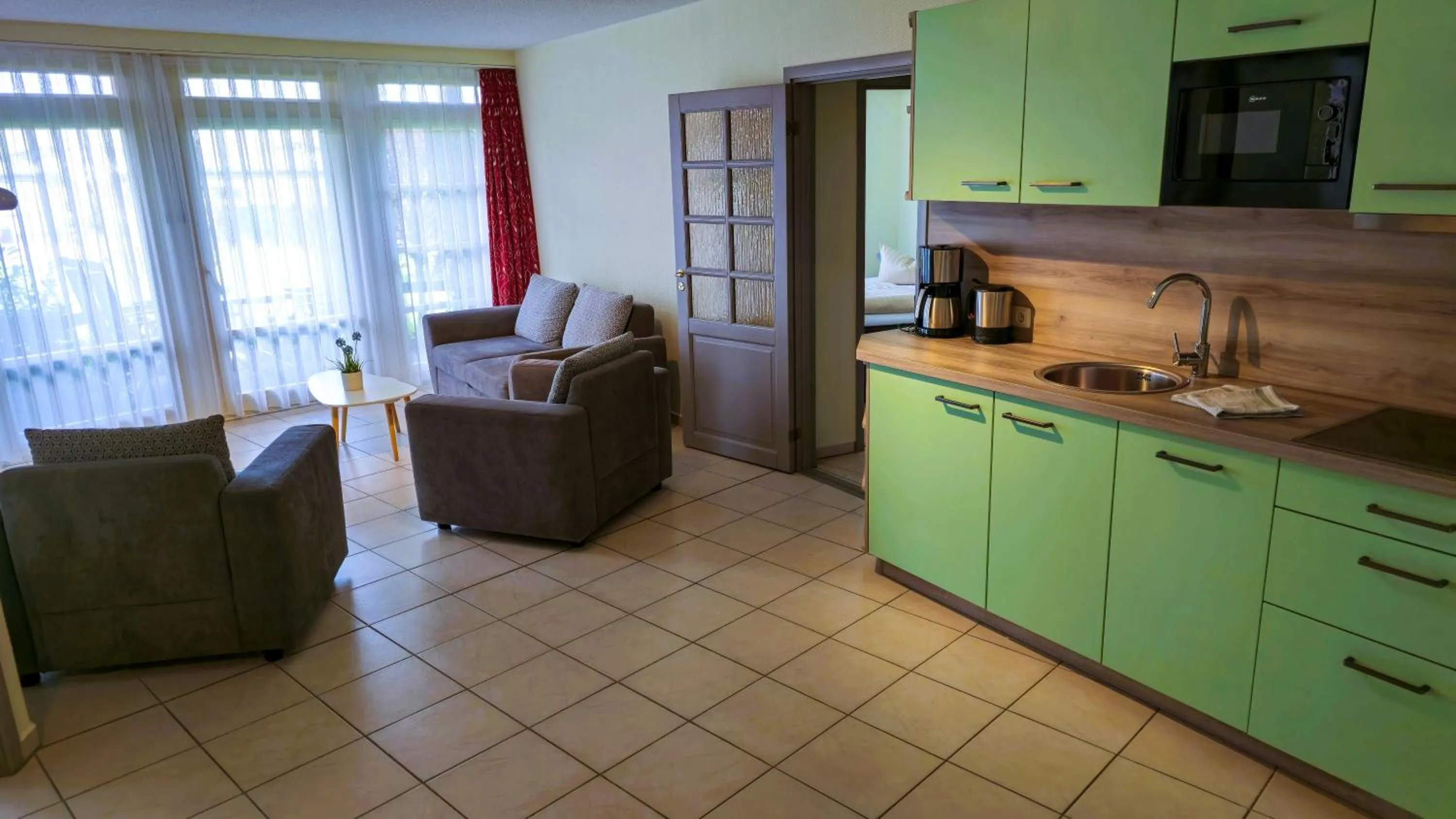 Kitchen or kitchenette in An der Metow-Ferienpark Hotel