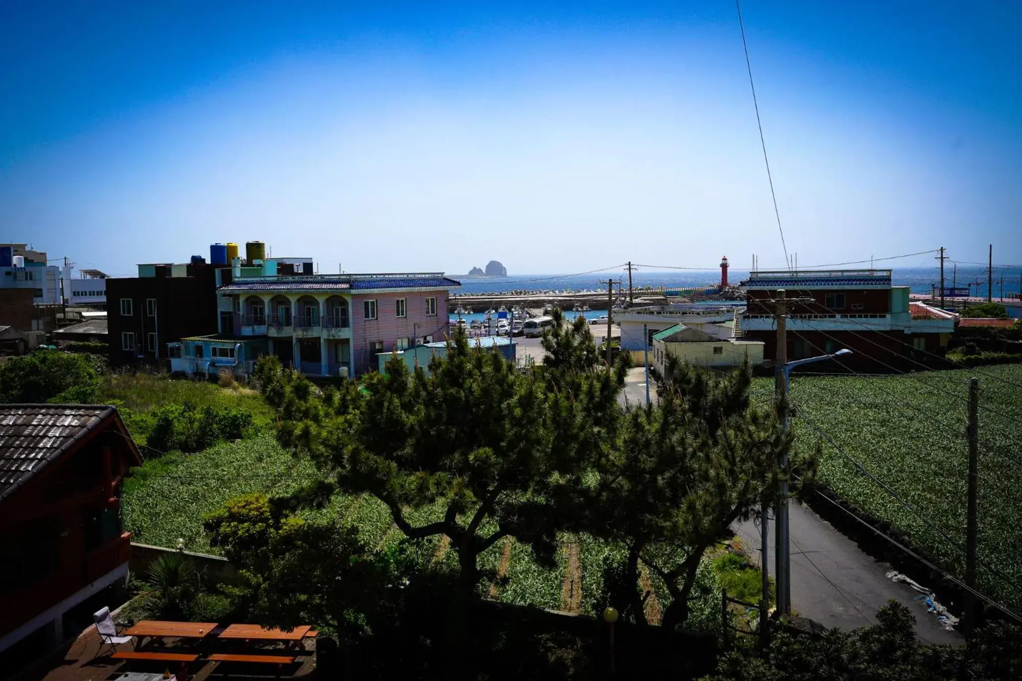 Deluxe Double Room with Balcony and Sea View in ttottot Jeju Backpackers Deluxe Double Room with Balcony and Sea View in ttottot Jeju Backpackers