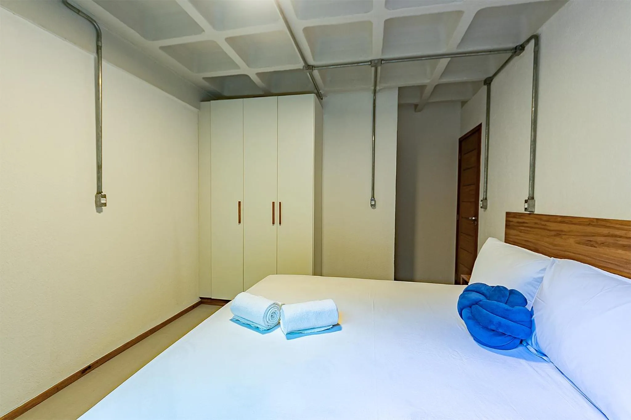 Bed in Antiquus ApartHotel