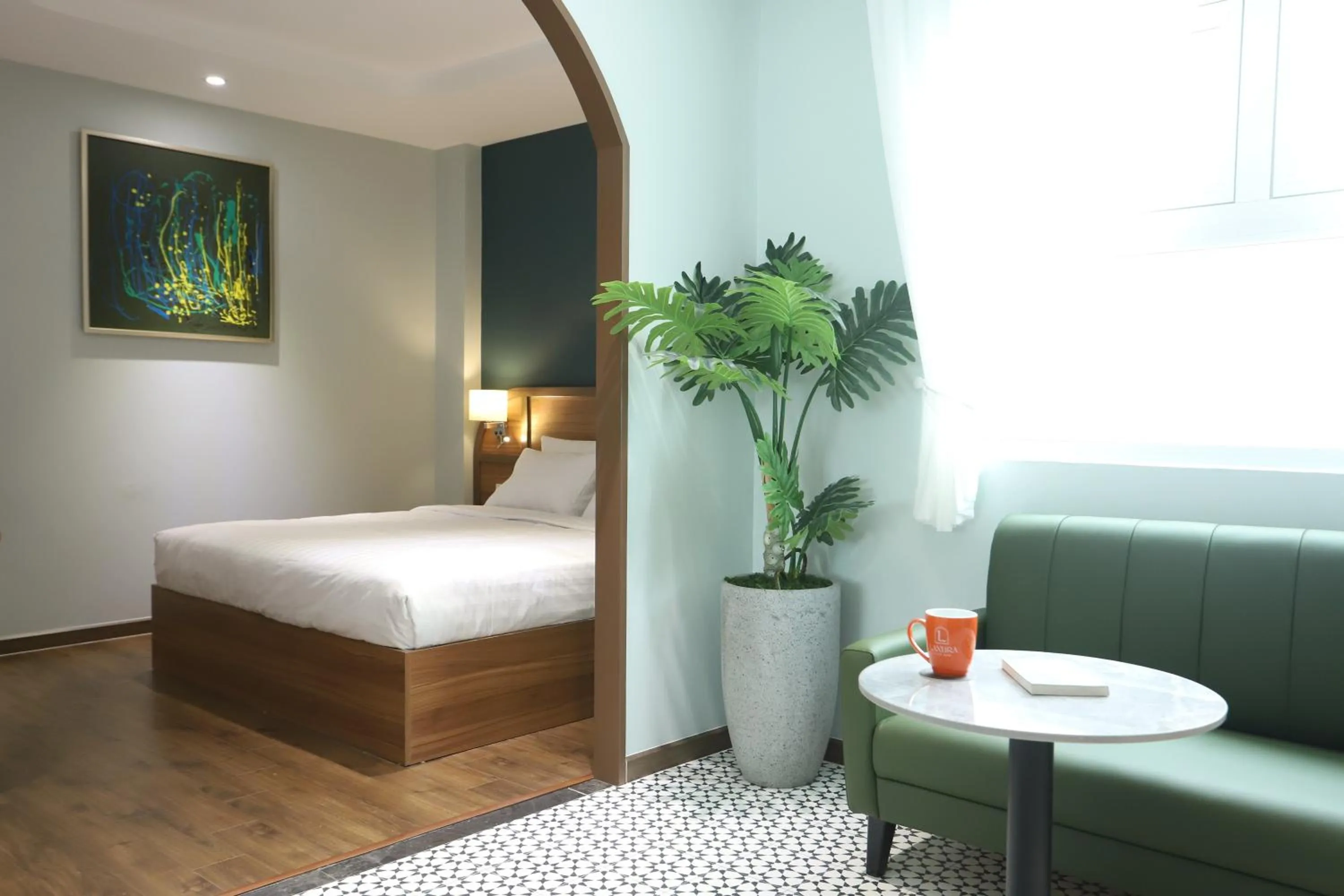 Bed in Lanura Apartments and Hotel