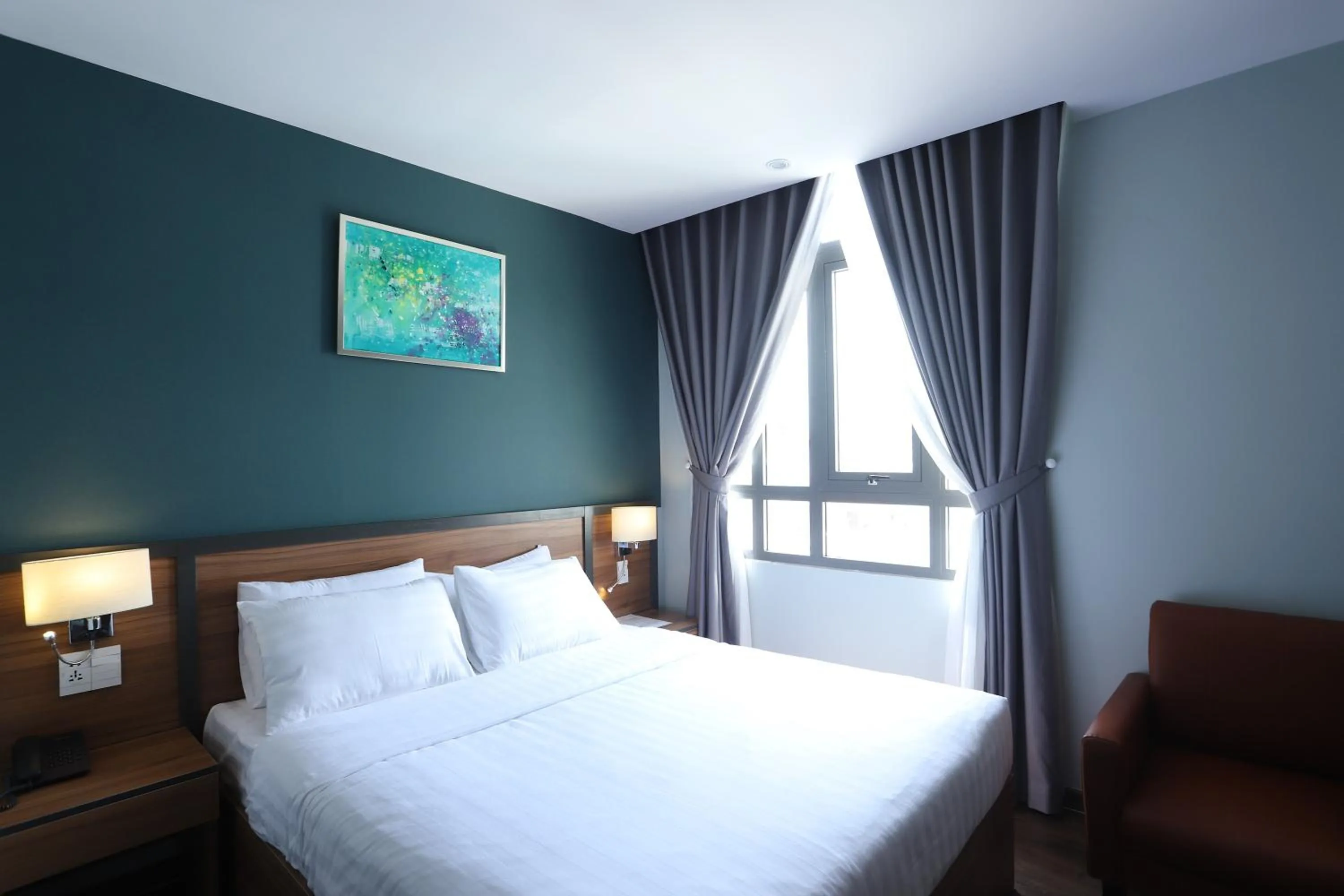 Bed in Lanura Apartments and Hotel