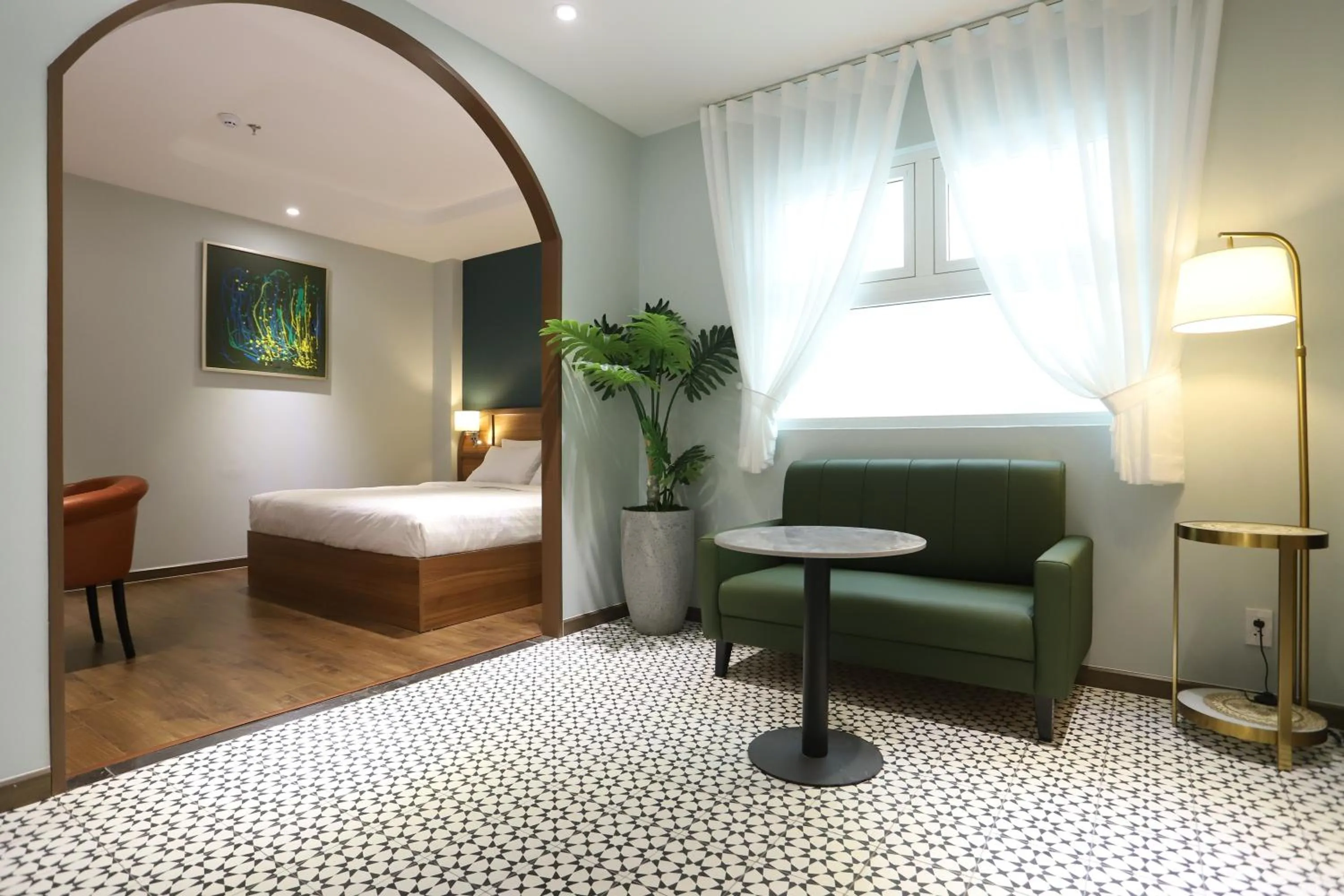 Bed in Lanura Apartments and Hotel