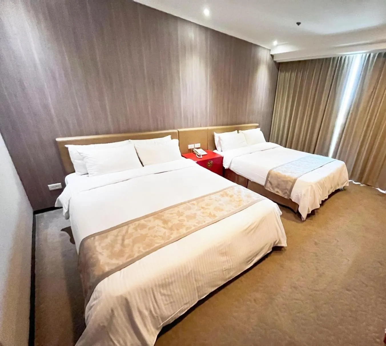 Bed in APVC Lukang Resort