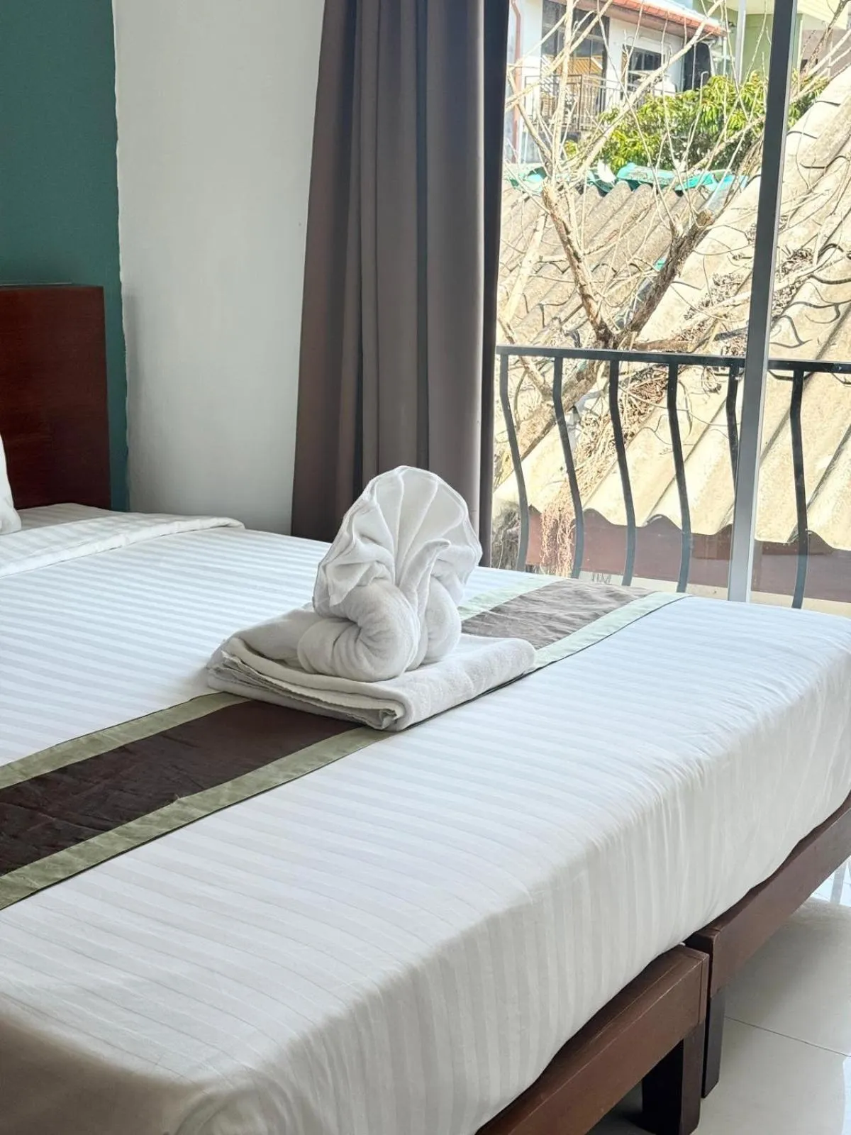 towels, Bed in La Xenia Hotel Kata Beach