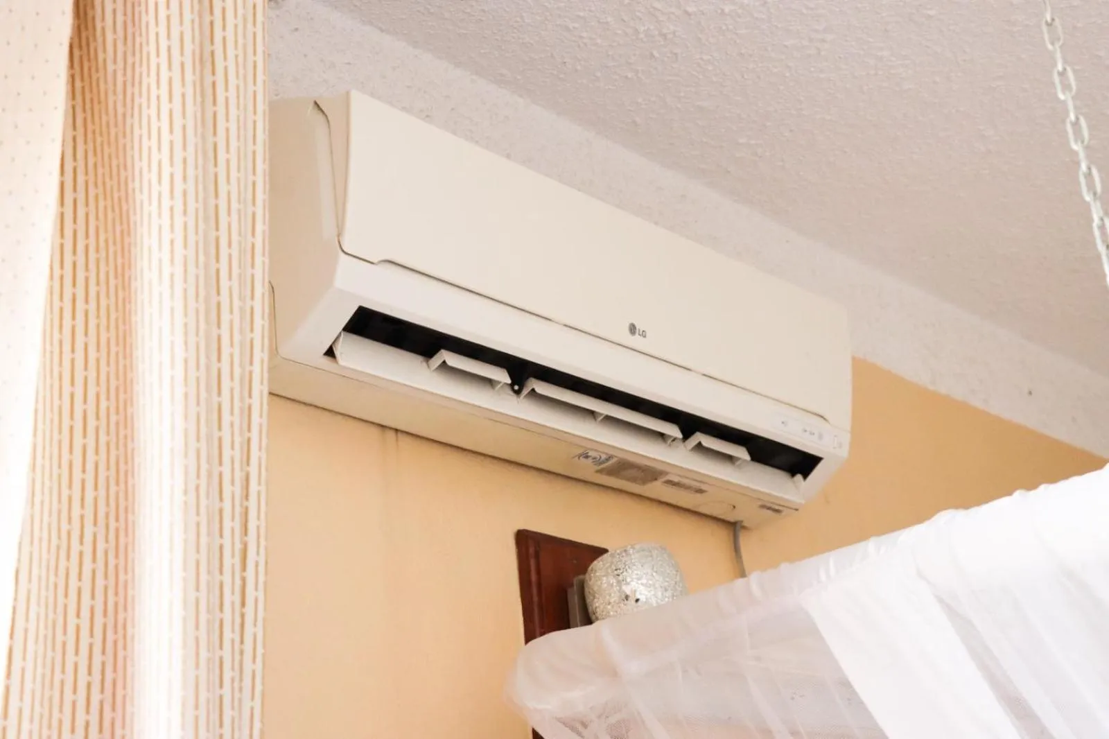 air conditioner, Bed in Bridge Hotel Mombasa