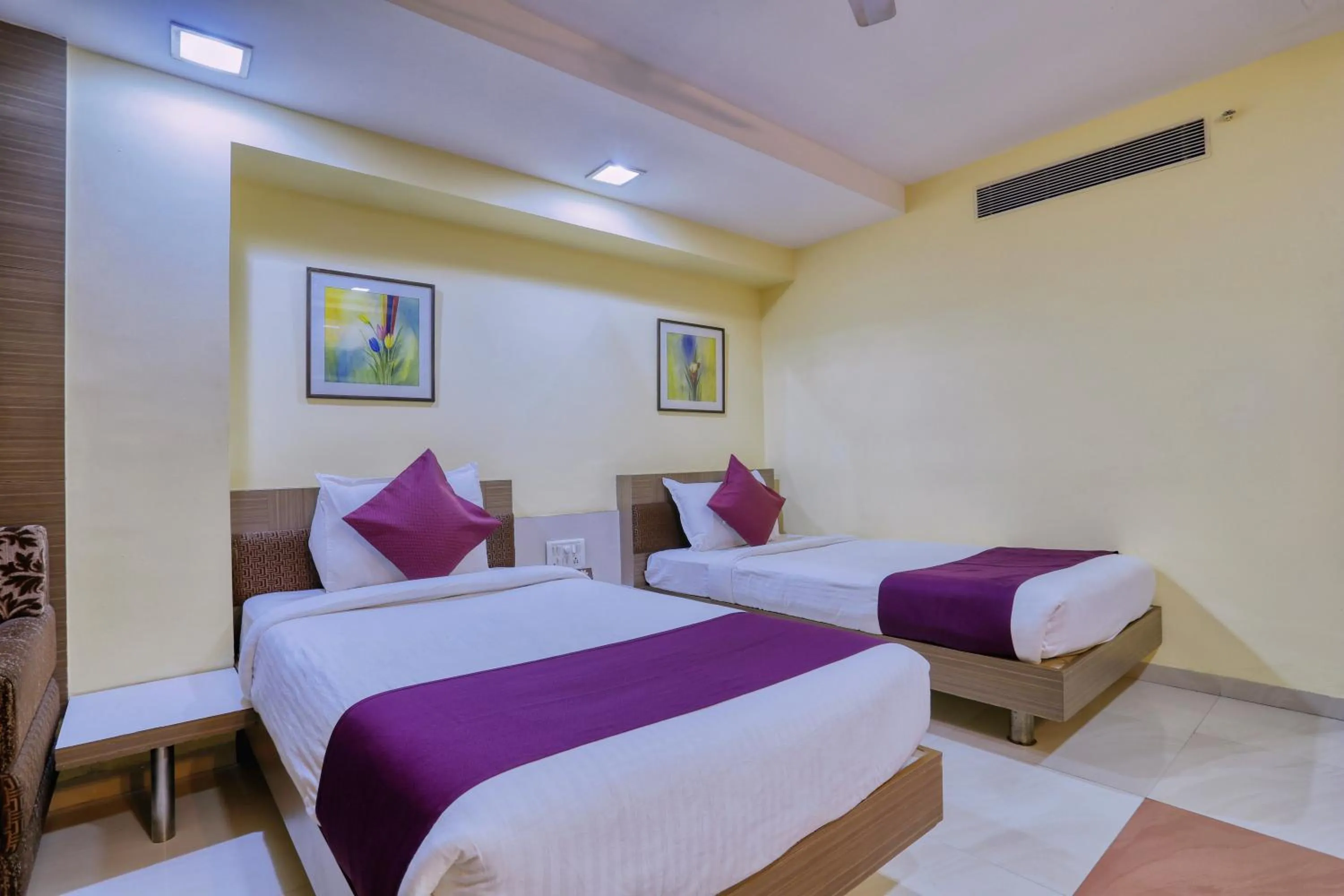 Bed in Hotel Amrit Residency