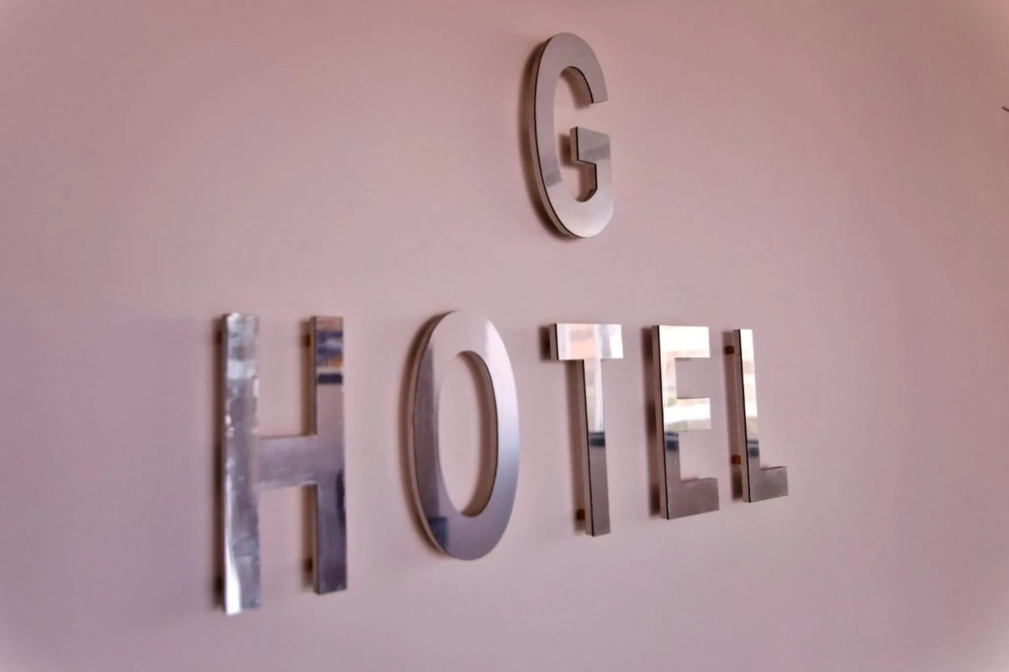 Property logo or sign in GHotel