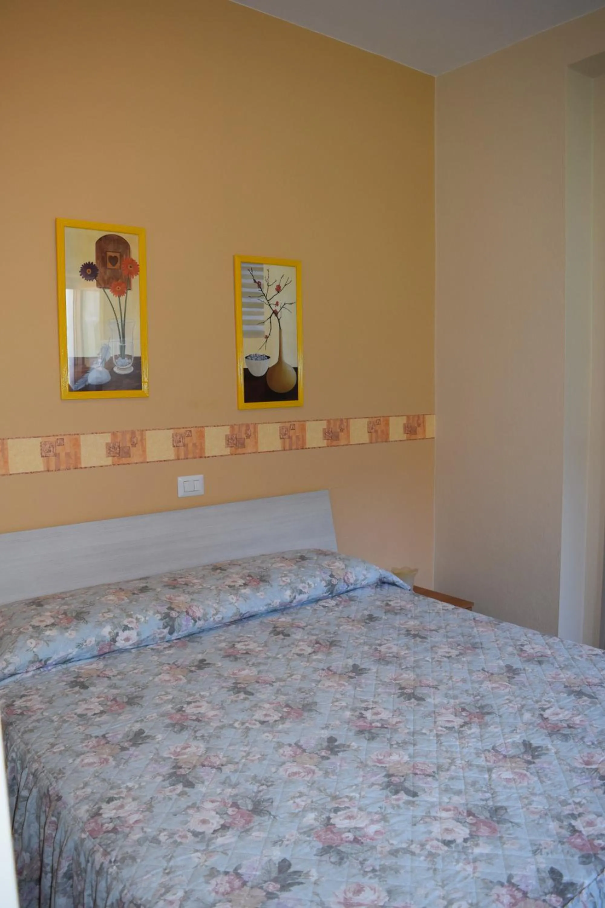 Bed in Albergo De Jean