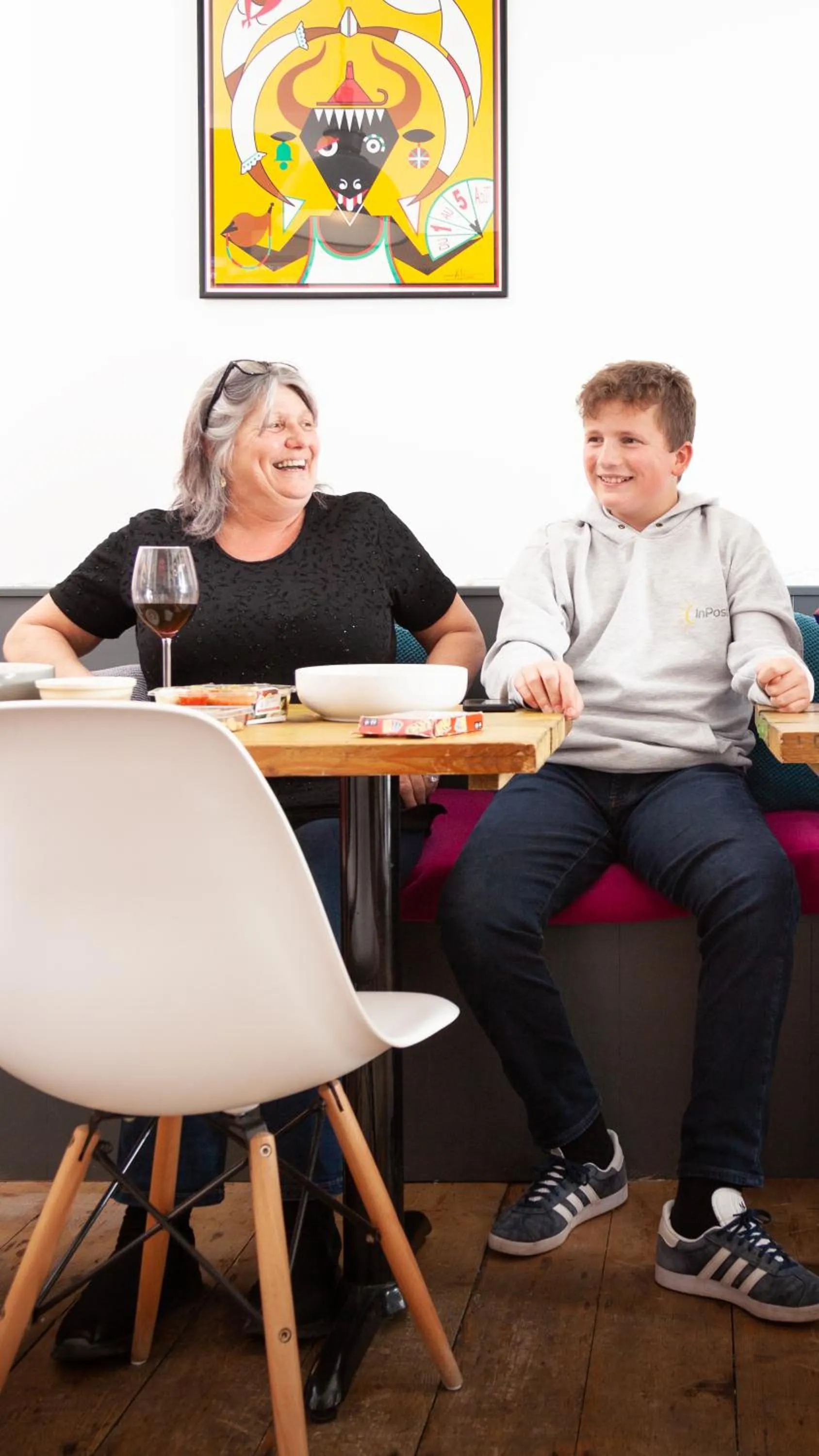 Communal lounge/ TV room in Ocean Backpackers self-catering hostel