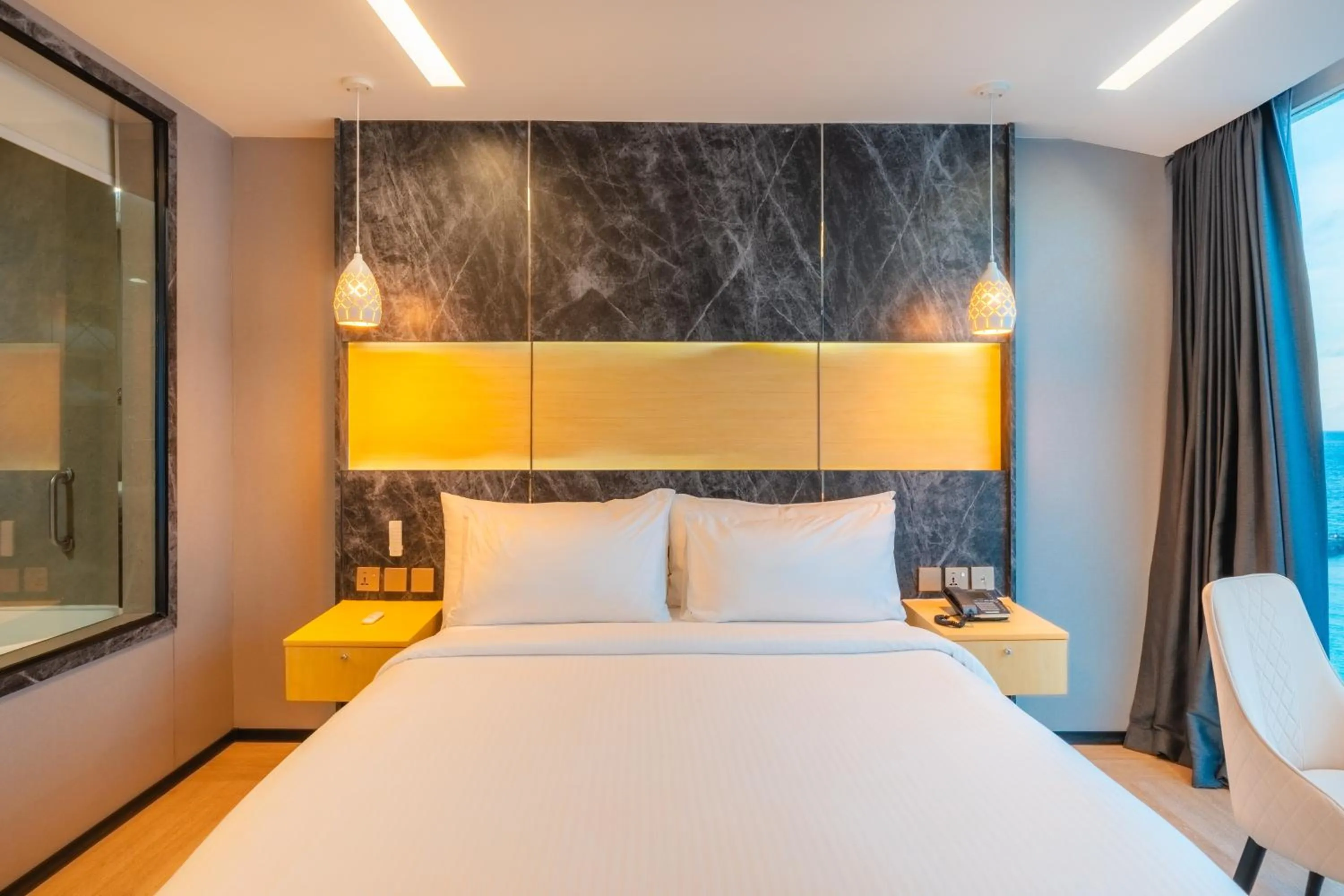 Bed in Swarn by Hawks Hotels Kamadhoo Baa Atoll