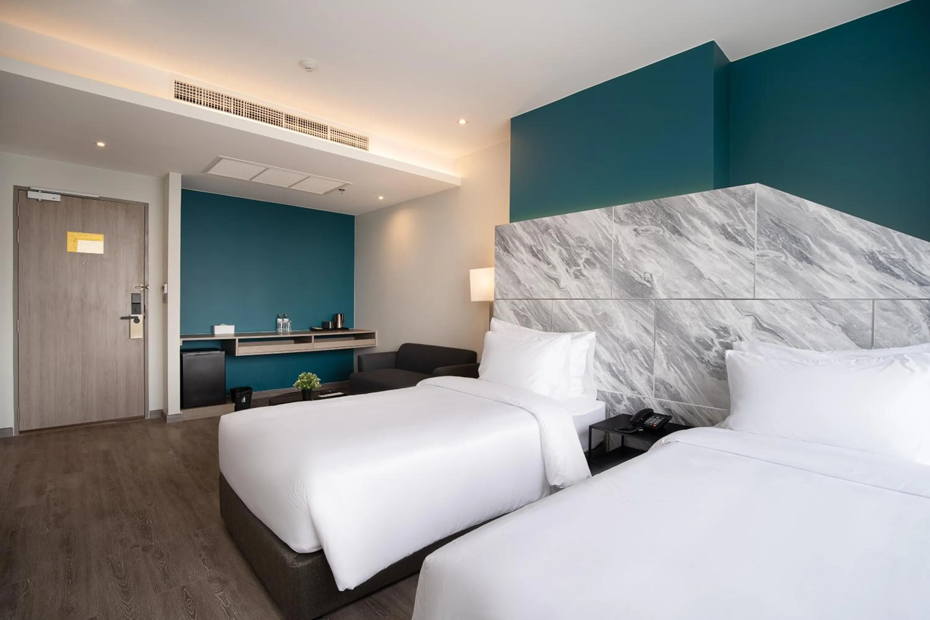 Bed in Thaya Hotel Bangkok