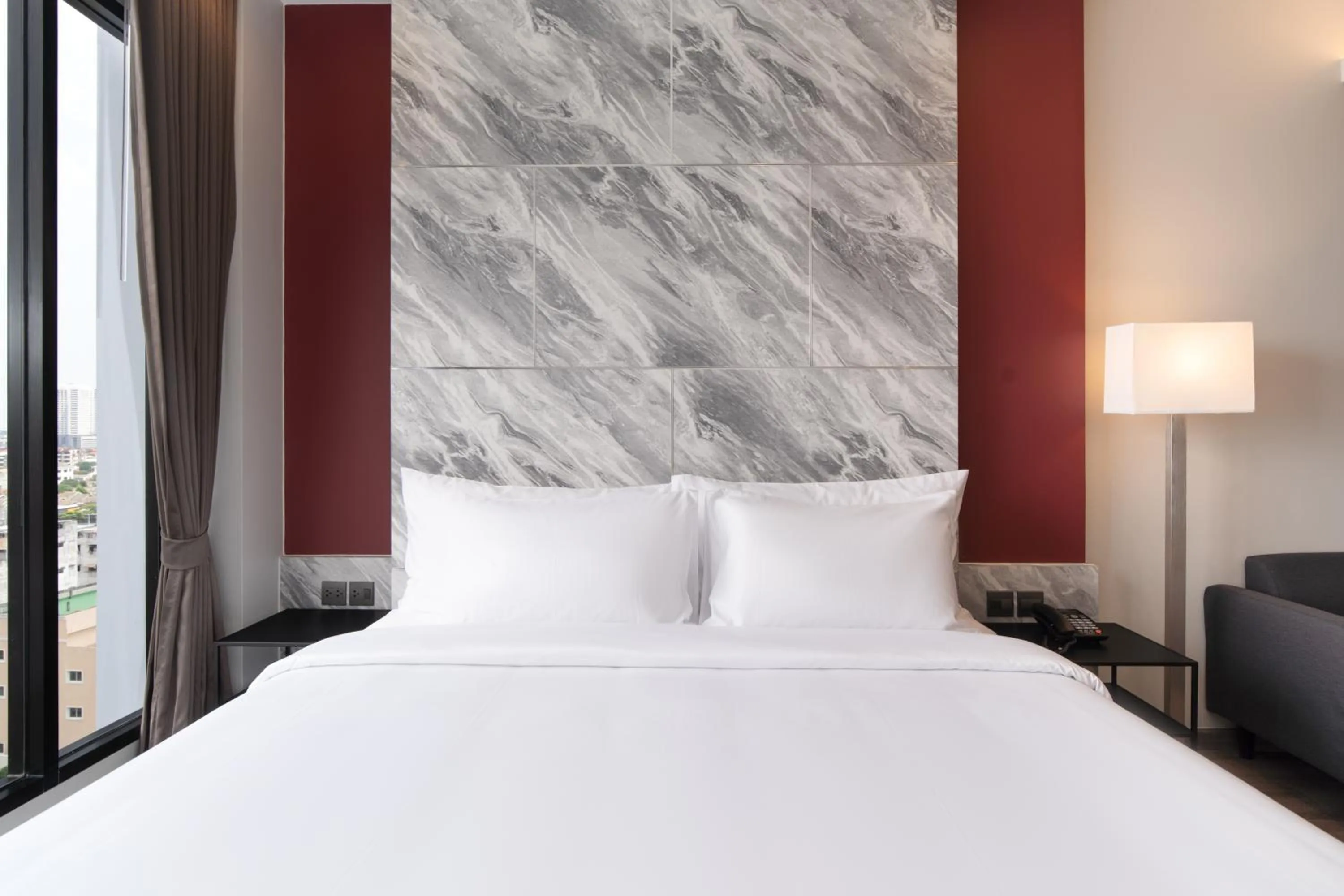 Bed in Thaya Hotel Bangkok