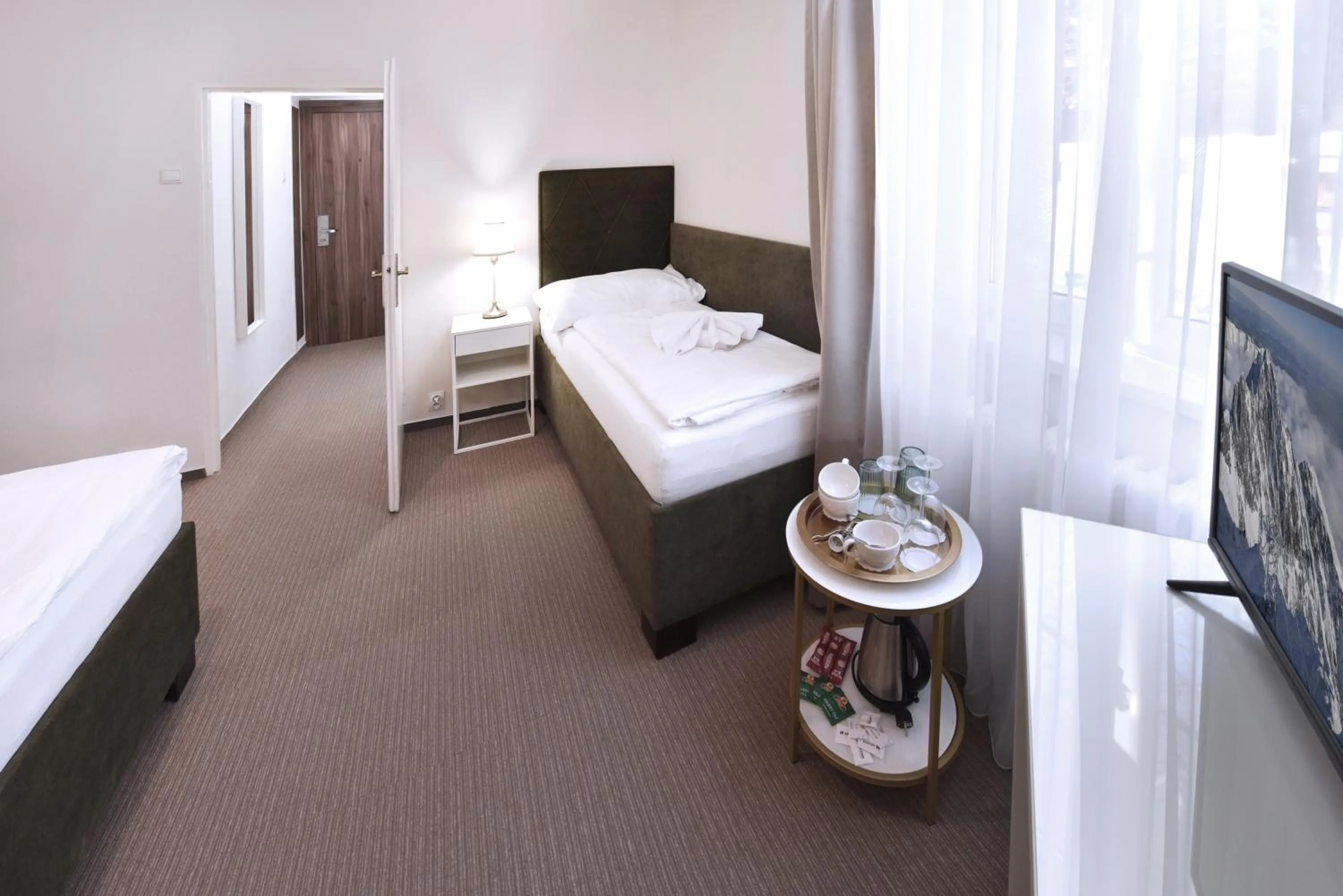 Photo of the whole room, Bed in APLEND Hotel Lujza Major