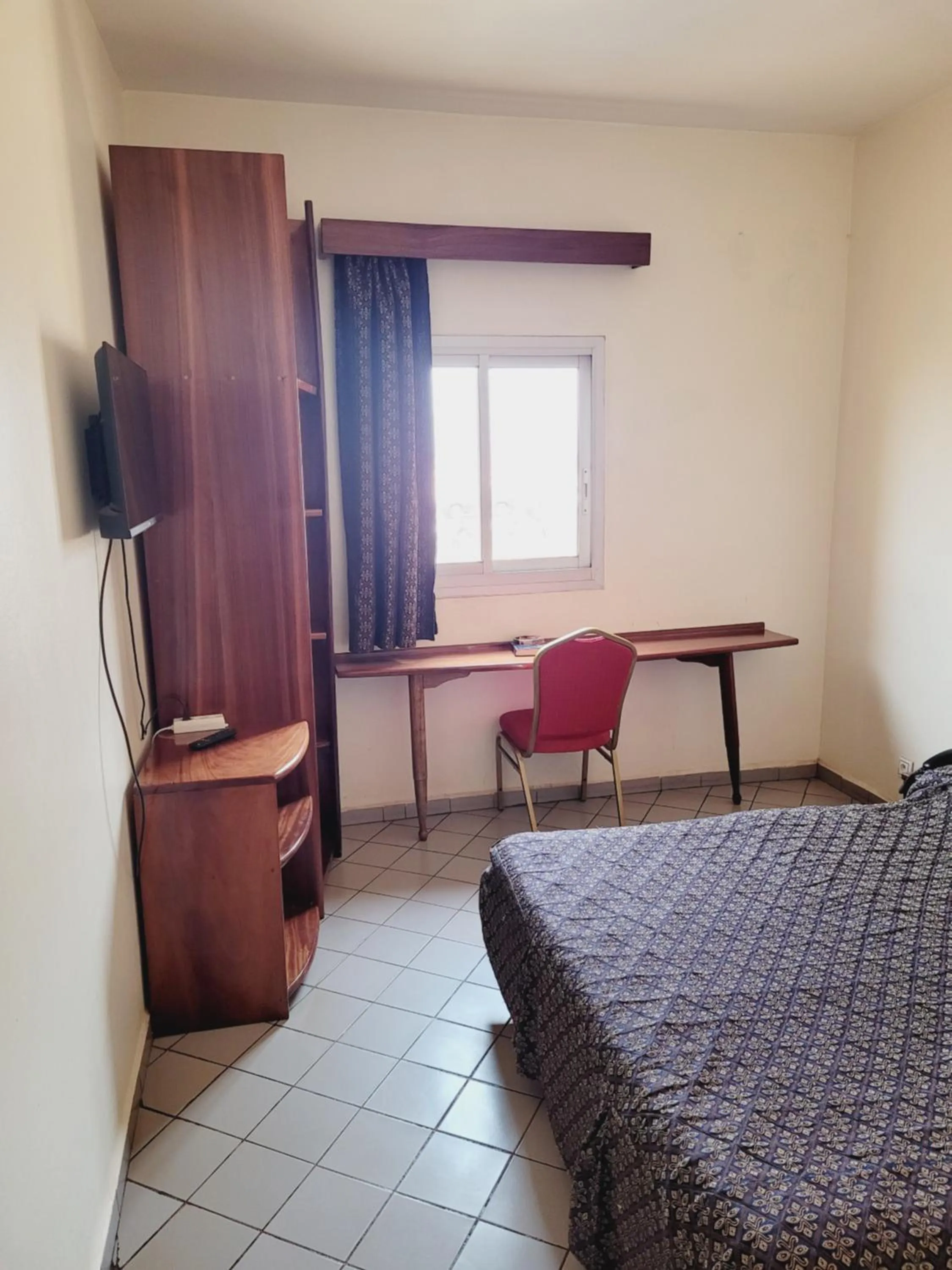 Bedroom in Hôtel Altitel