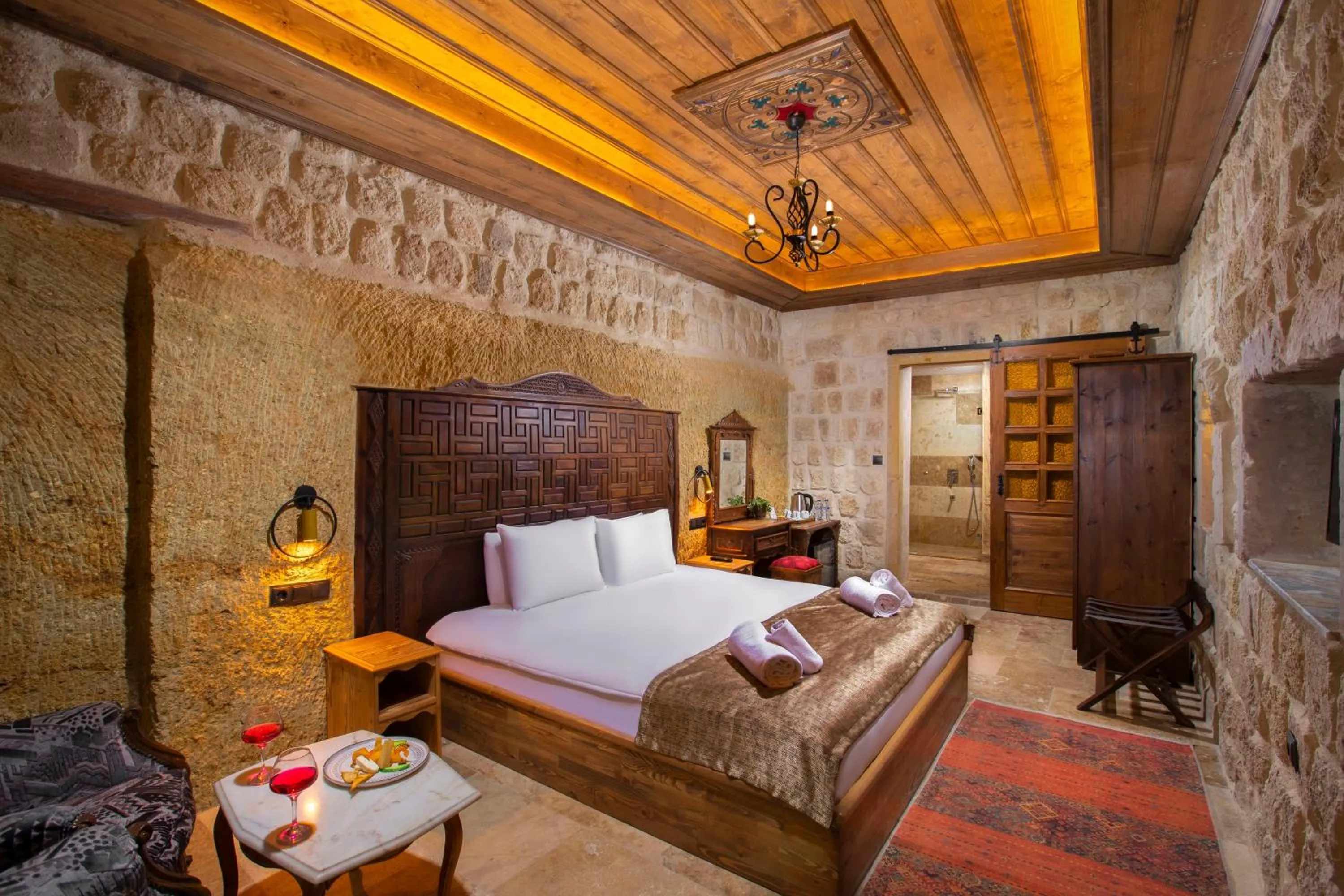 Bed in Dionysos Cave Cappadocia Hotel