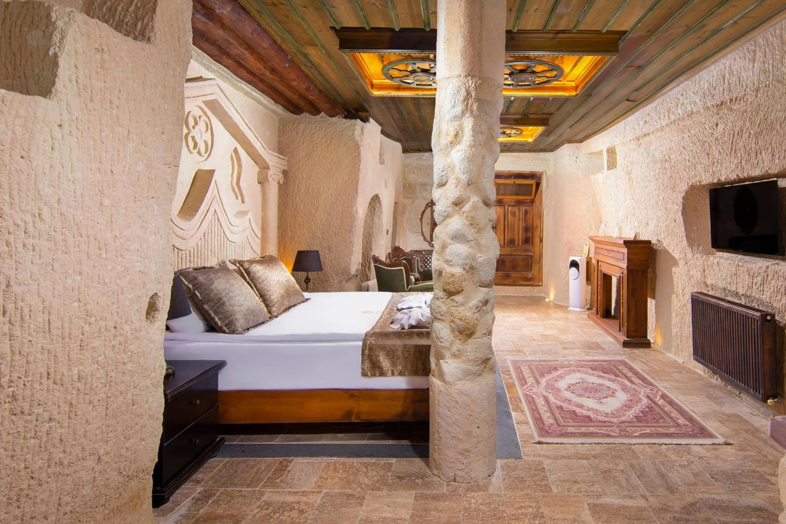 Bed in Dionysos Cave Cappadocia Hotel