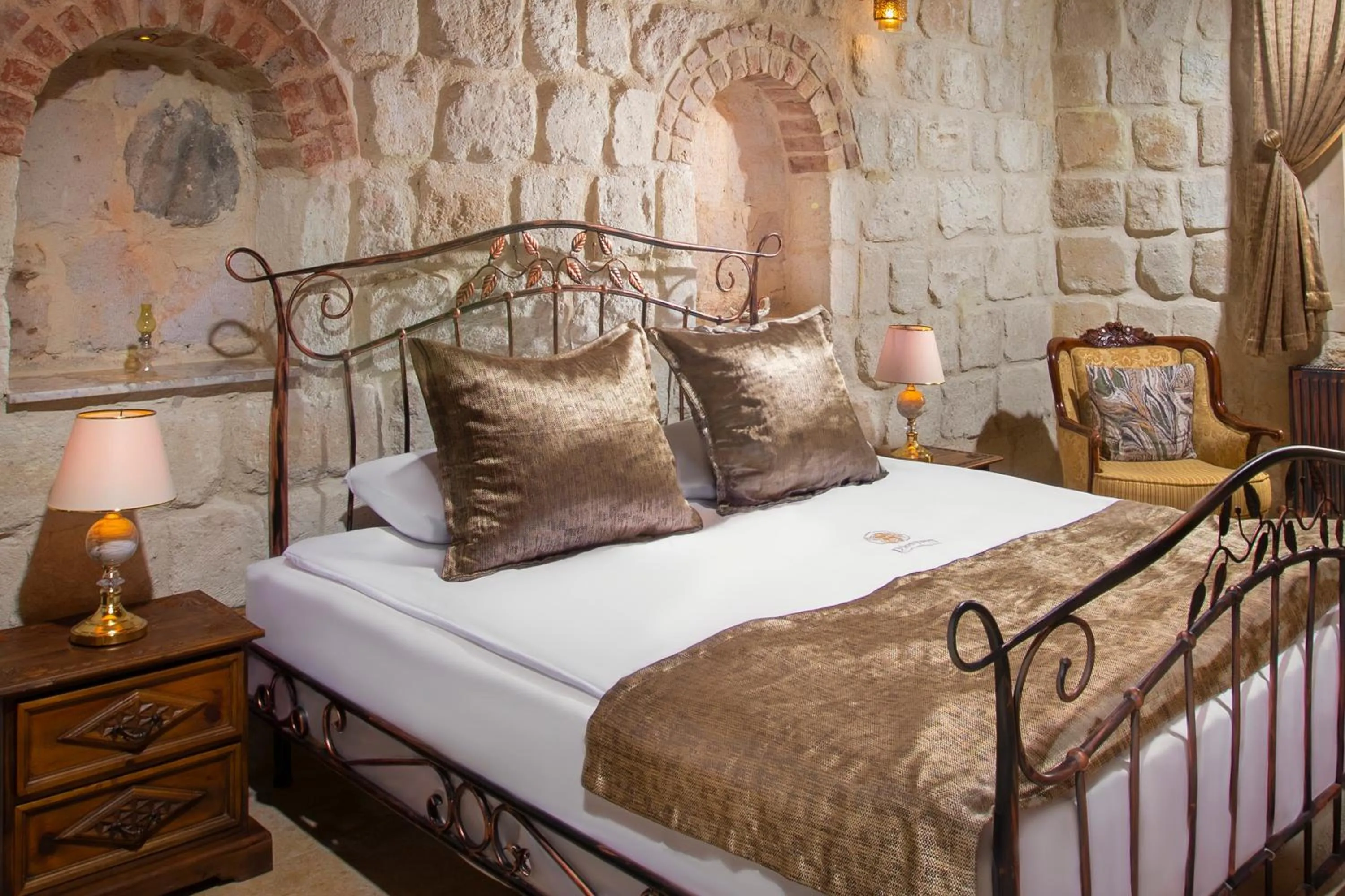 Bed in Dionysos Cave Cappadocia Hotel