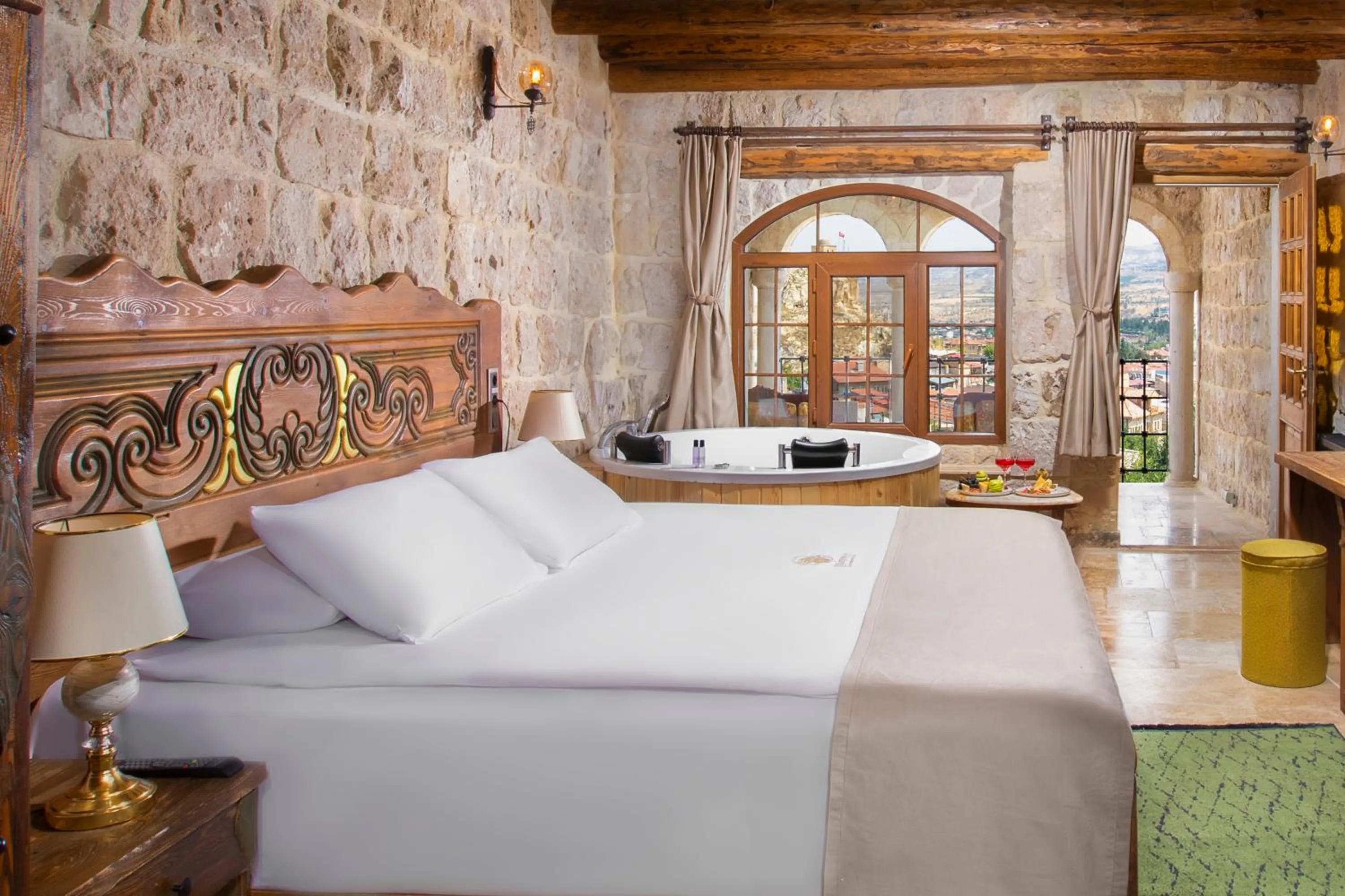 Bed in Dionysos Cave Cappadocia Hotel