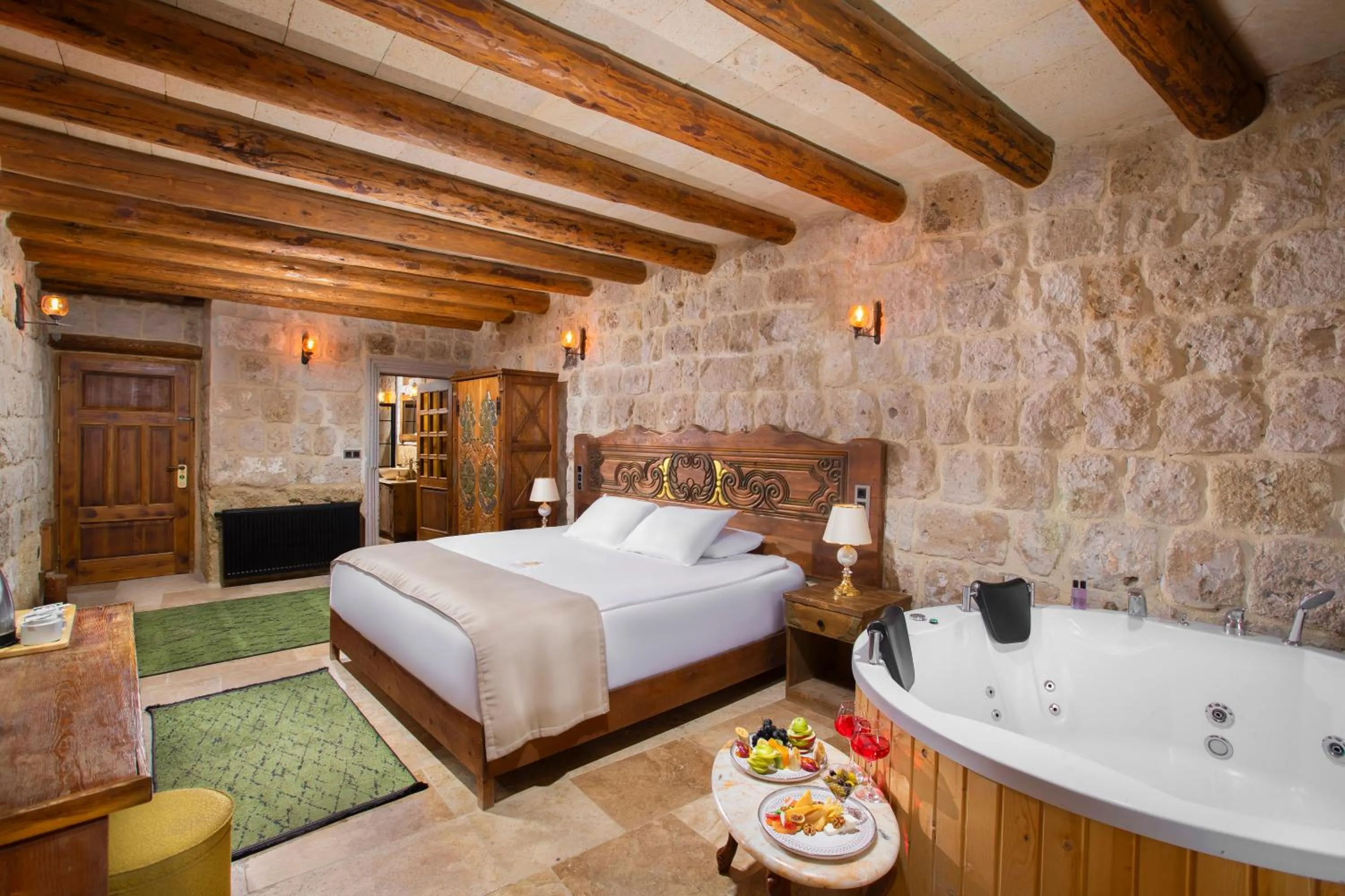 Bed in Dionysos Cave Cappadocia Hotel