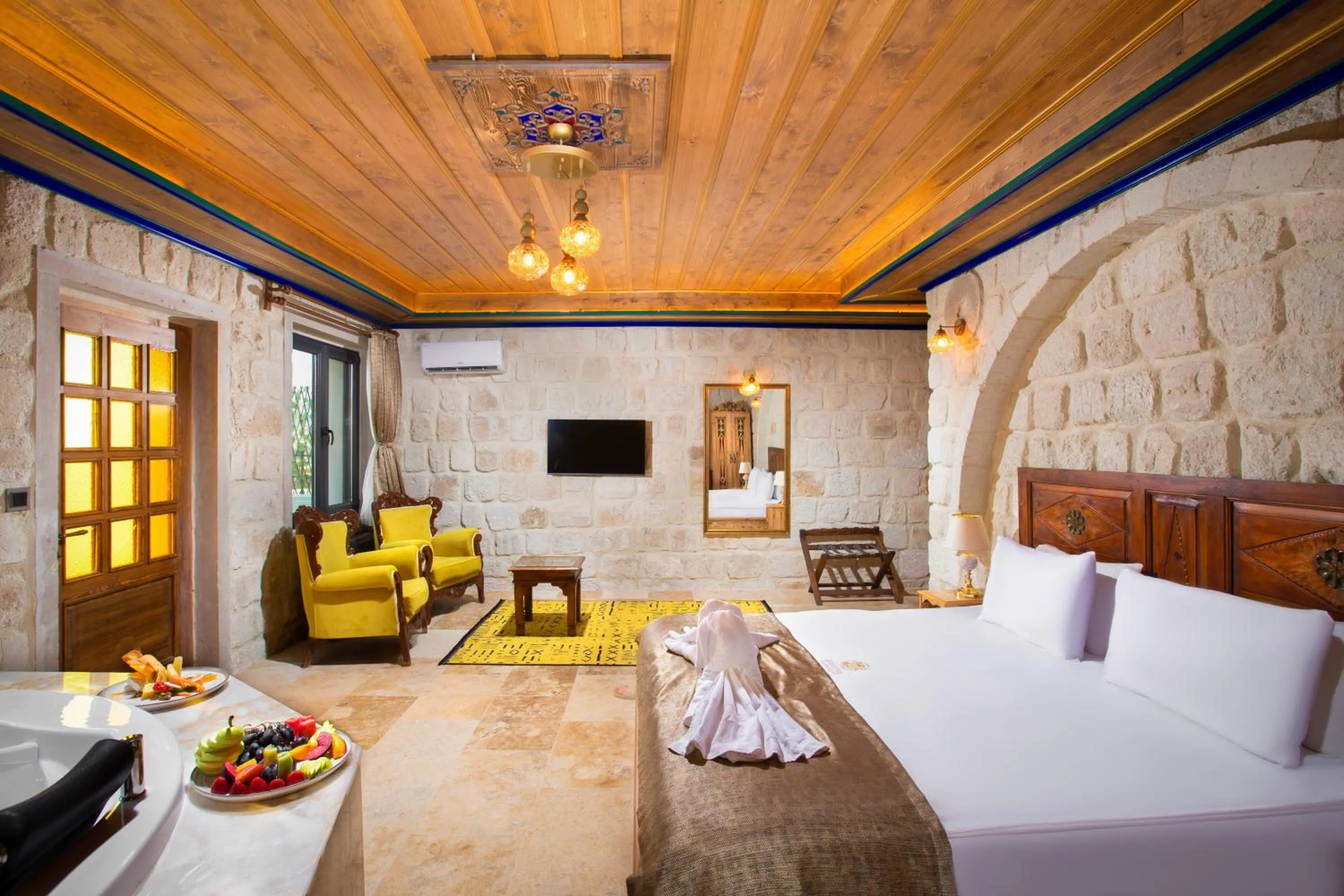 Bed in Dionysos Cave Cappadocia Hotel