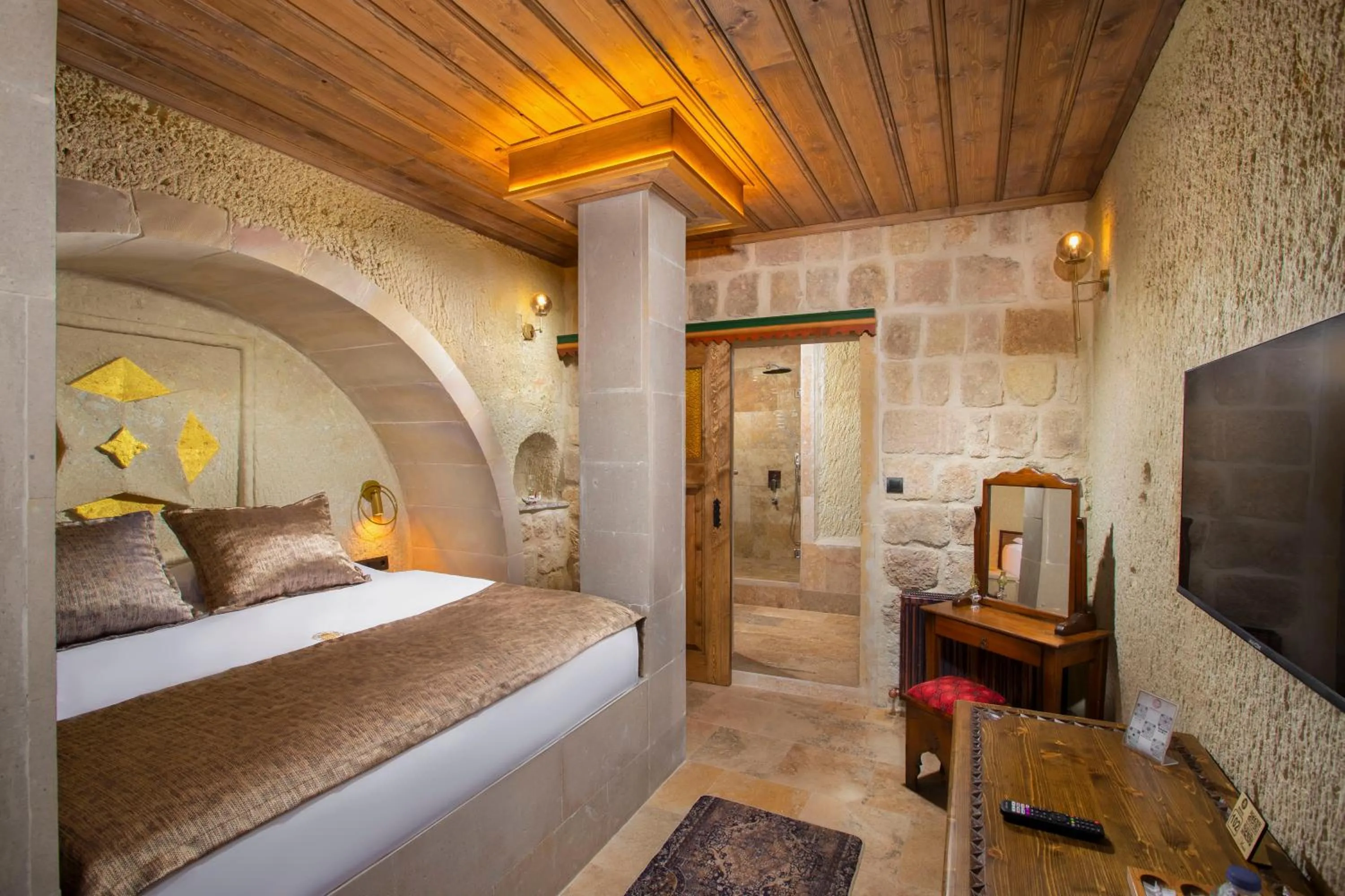 Bed in Dionysos Cave Cappadocia Hotel
