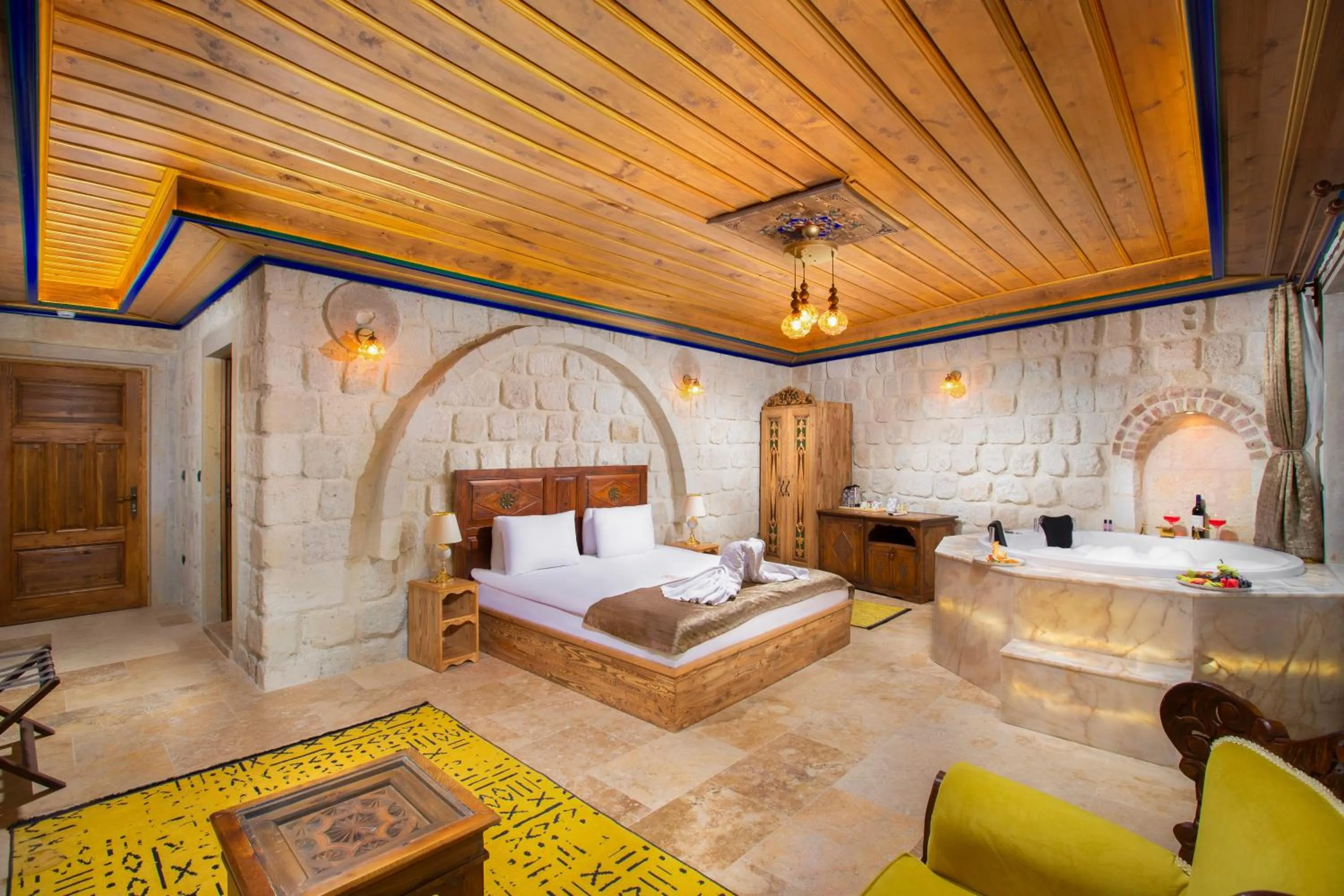 Bed in Dionysos Cave Cappadocia Hotel