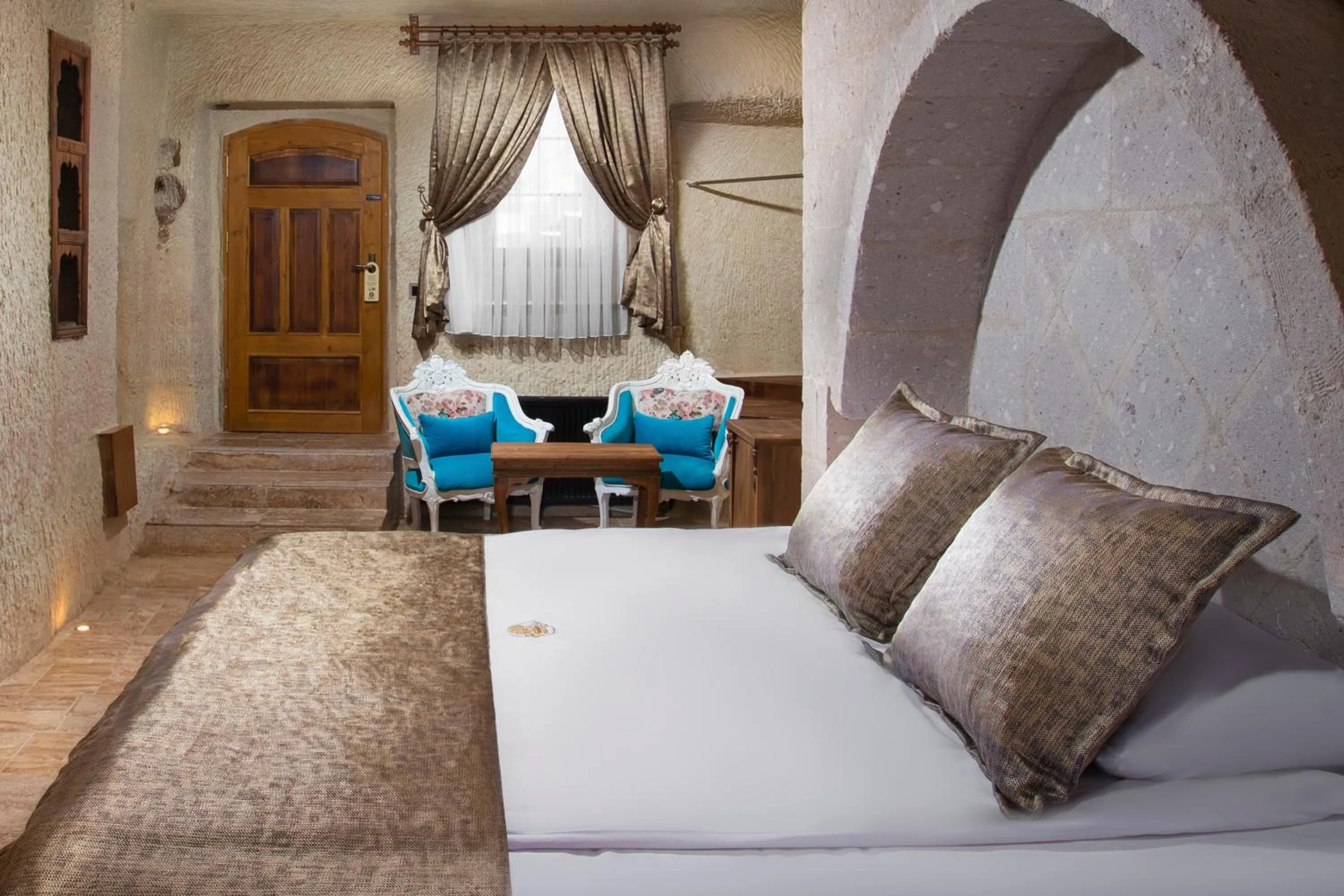 Bed in Dionysos Cave Cappadocia Hotel