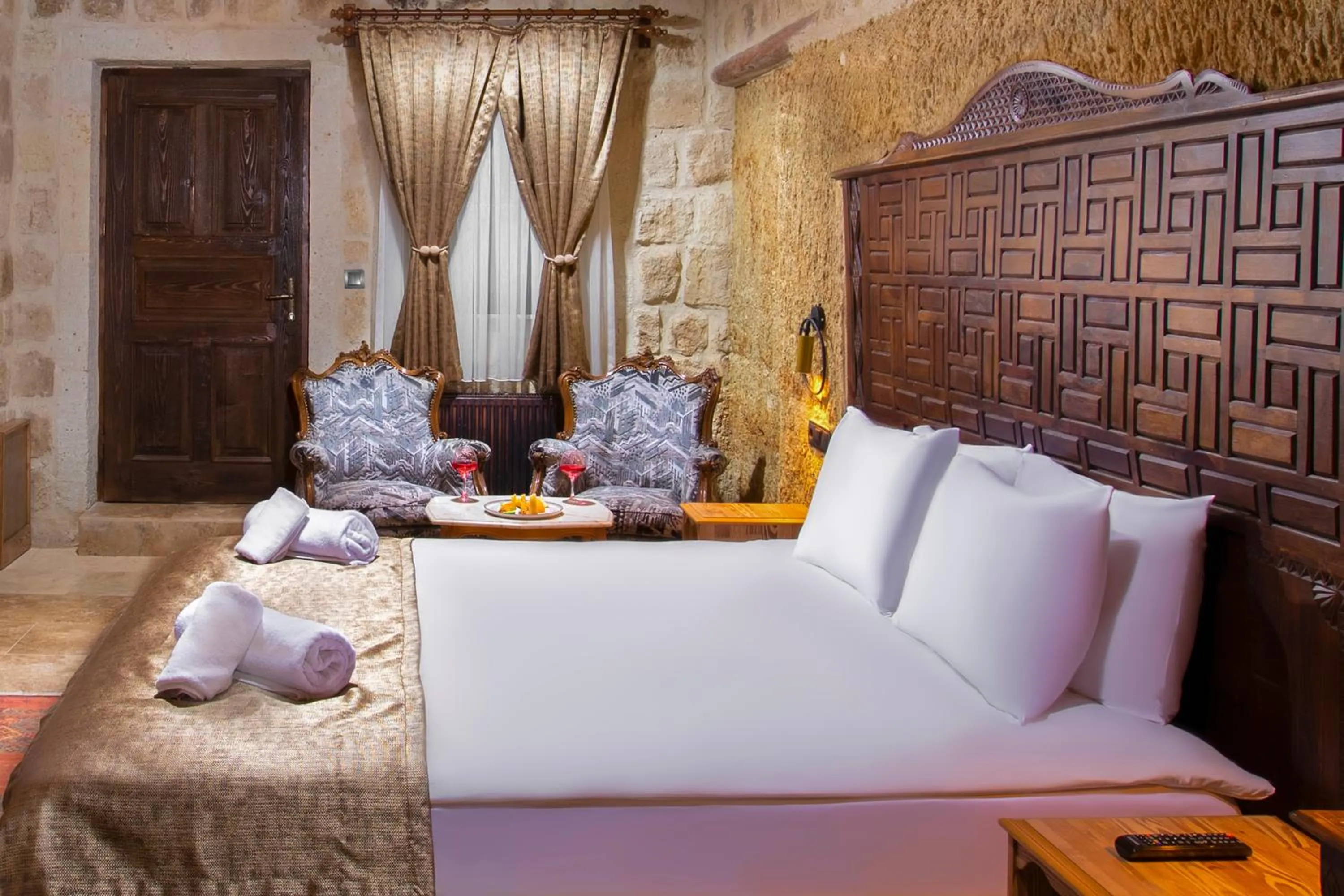 Bed in Dionysos Cave Cappadocia Hotel