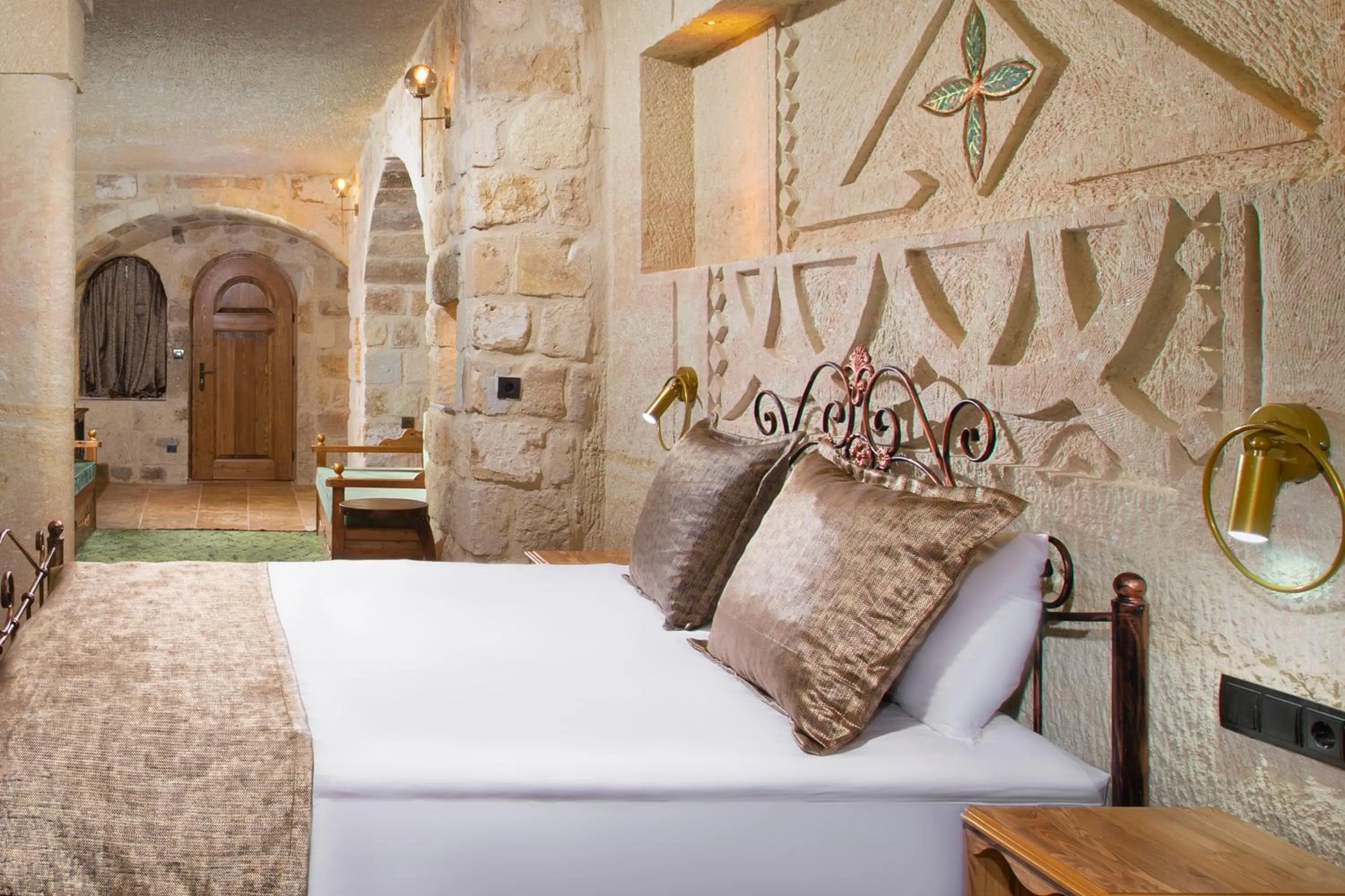 Bed in Dionysos Cave Cappadocia Hotel