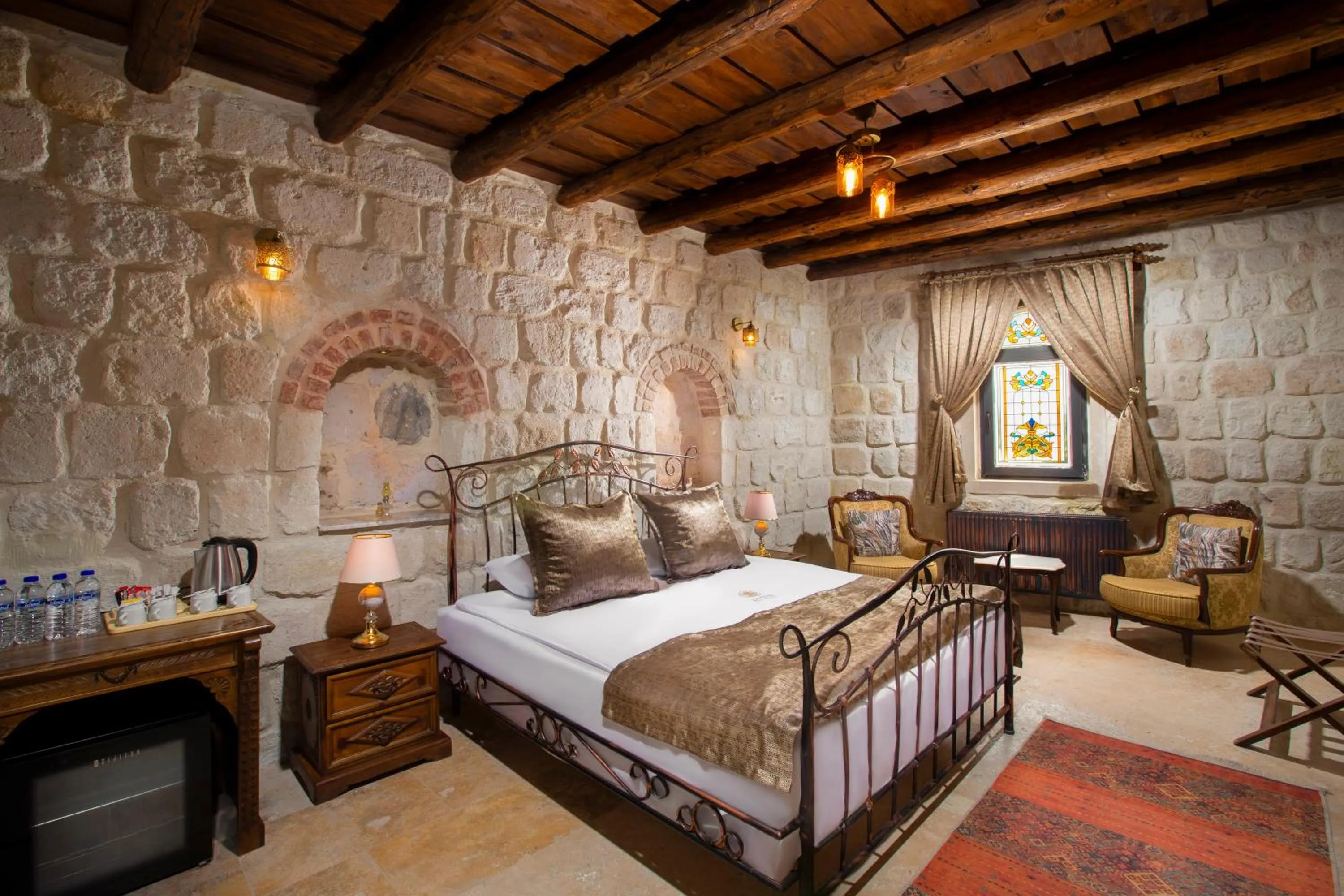 Bed in Dionysos Cave Cappadocia Hotel