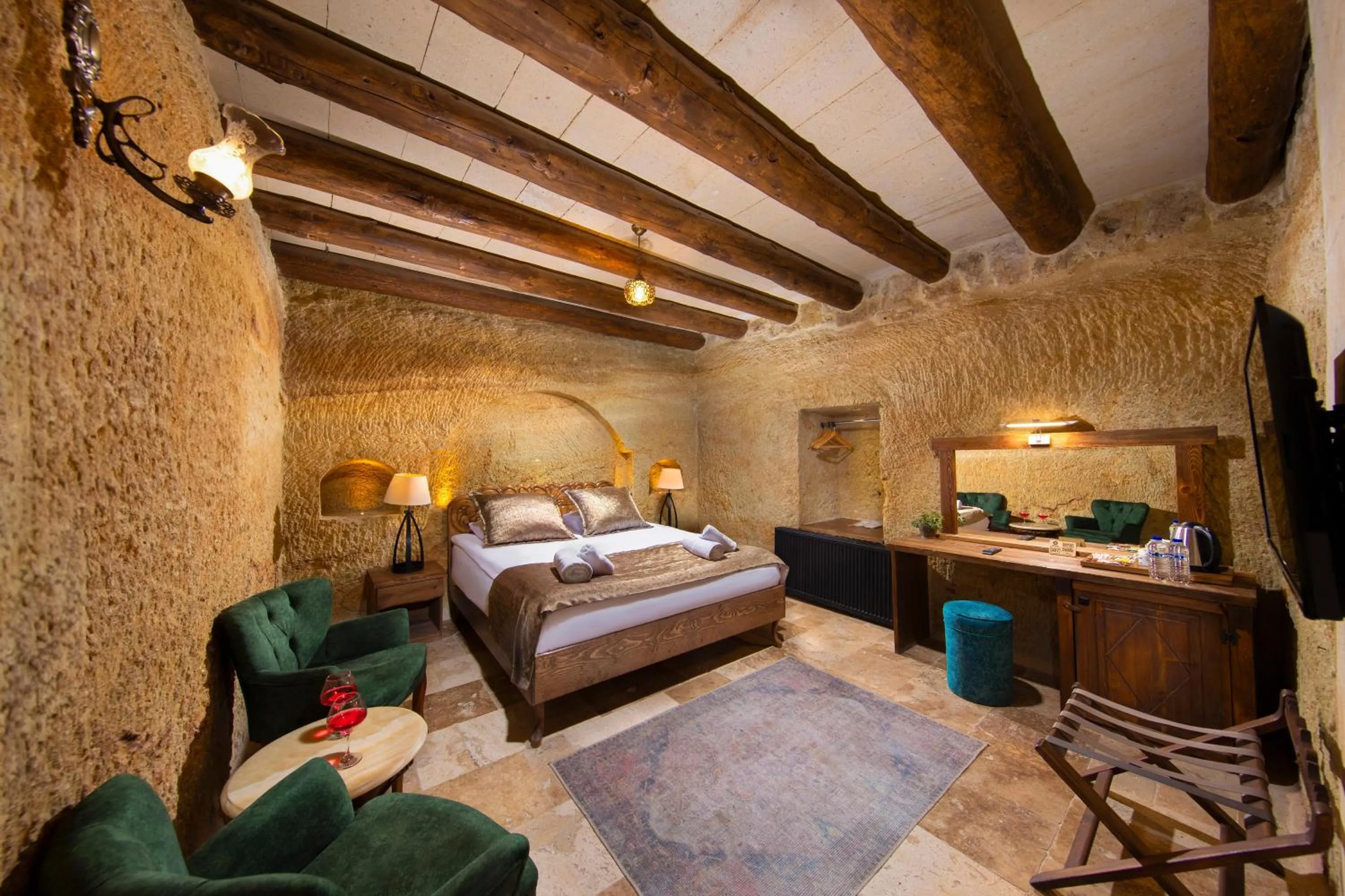 Bed in Dionysos Cave Cappadocia Hotel