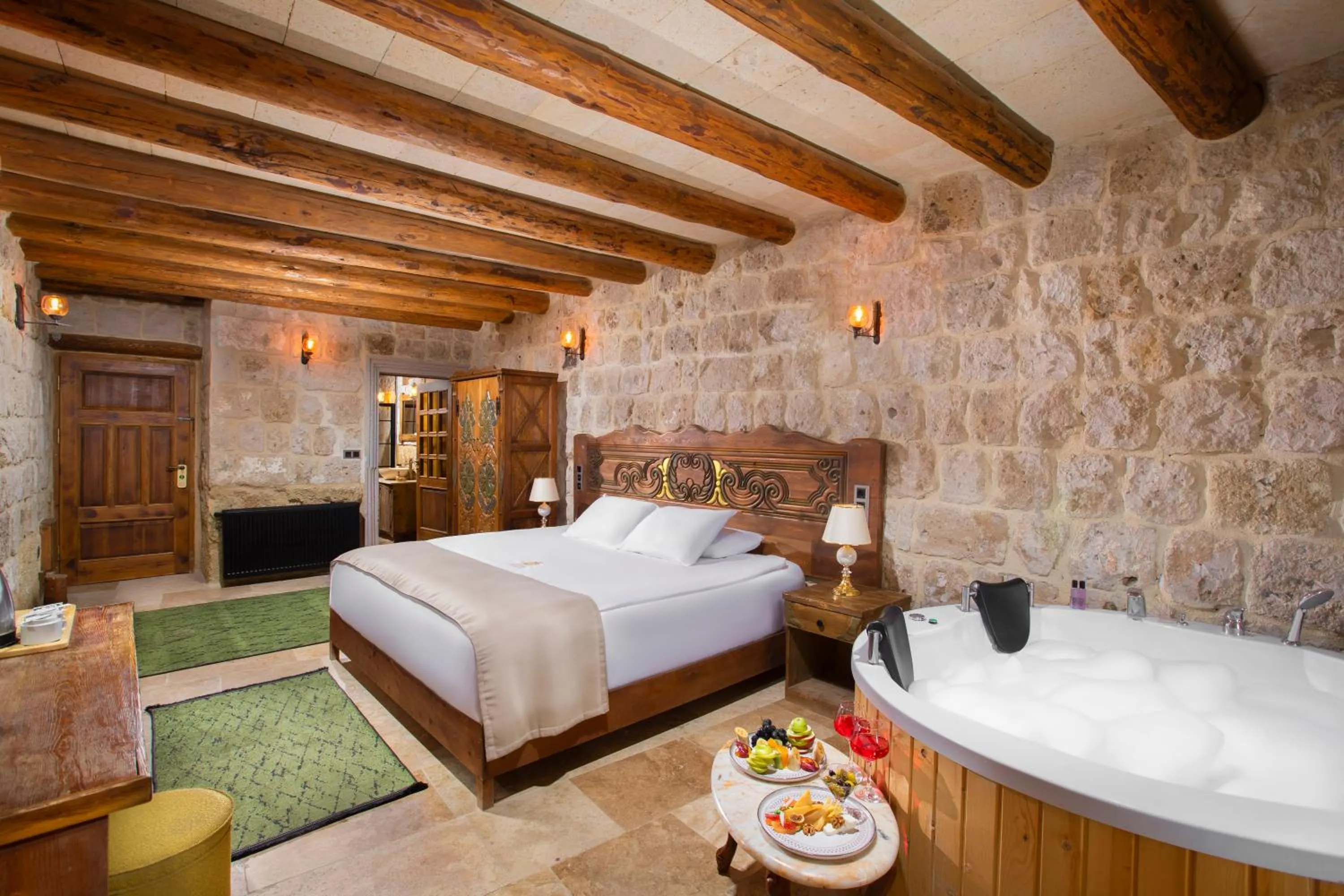 Bed in Dionysos Cave Cappadocia Hotel