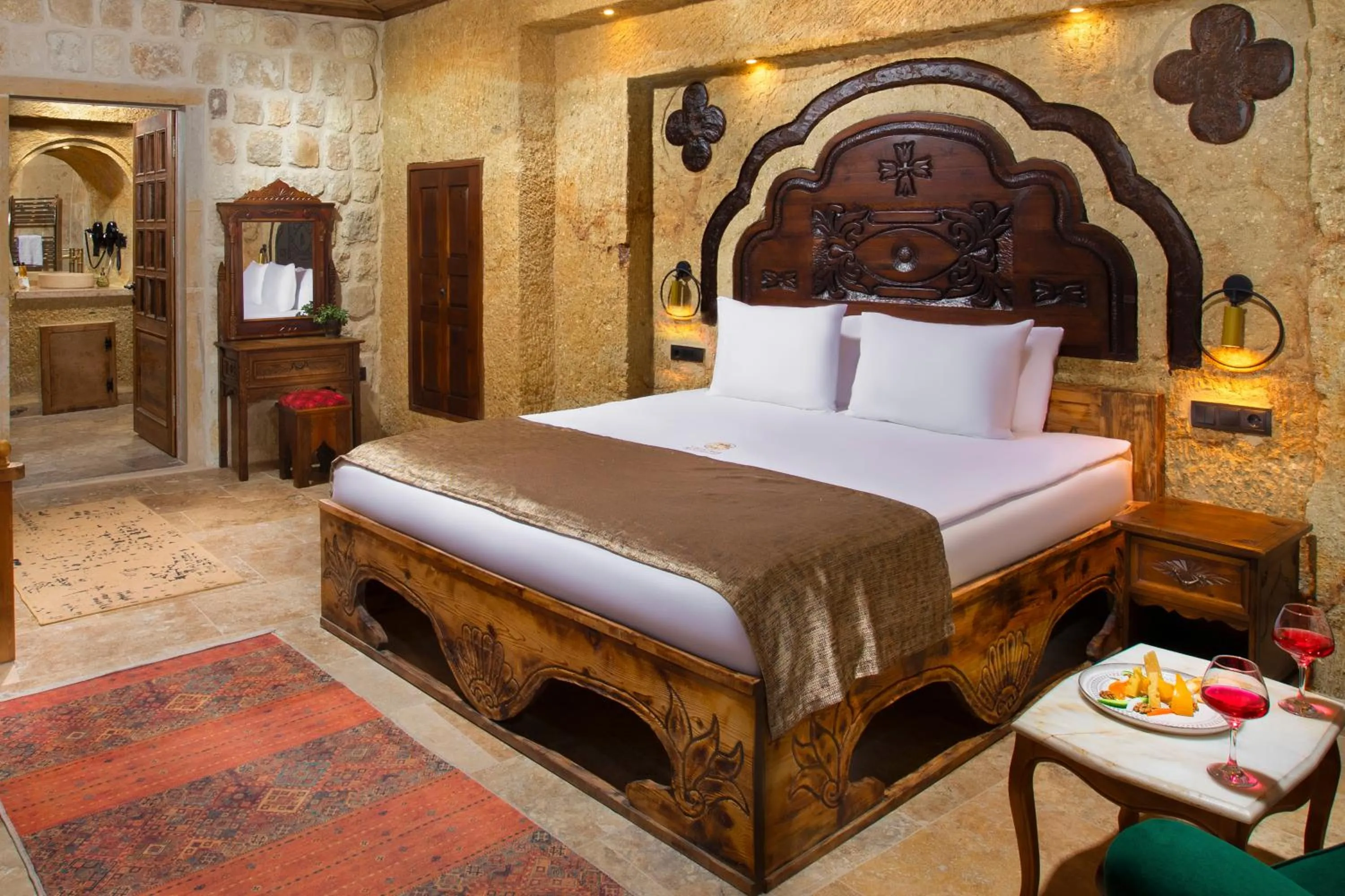 Bed in Dionysos Cave Cappadocia Hotel