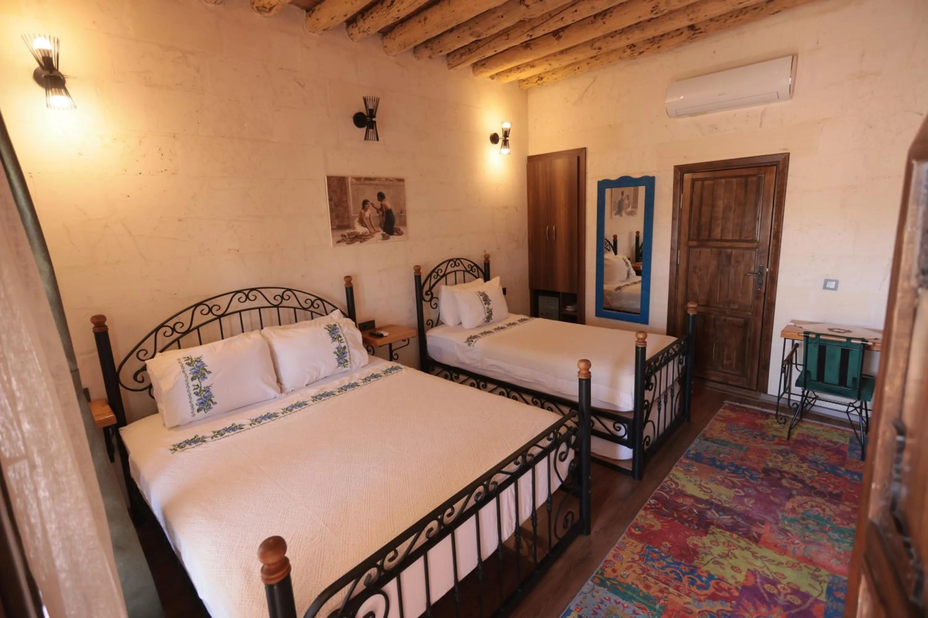 Bed in ASTARTE HOTEL