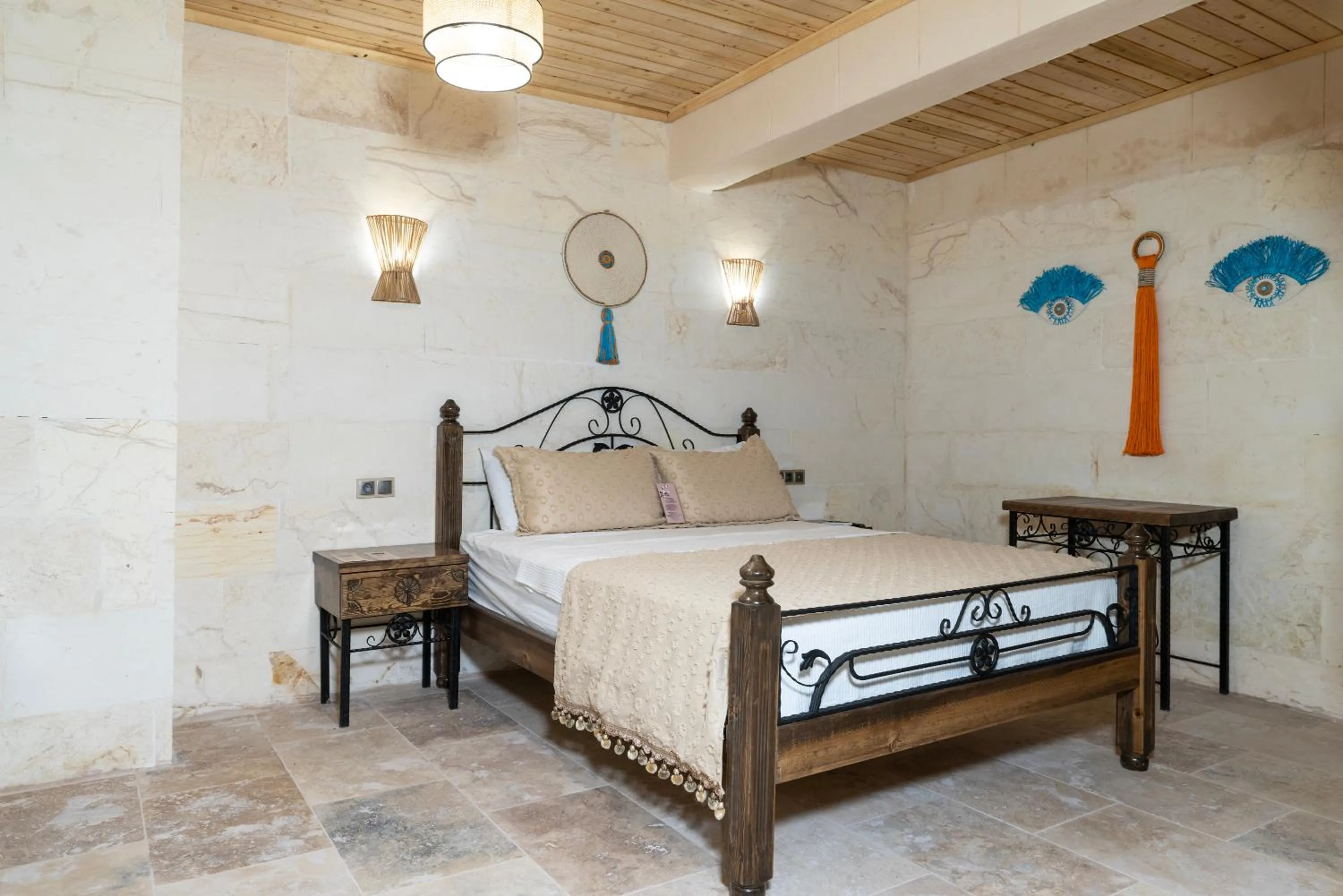 Bed in ASTARTE HOTEL