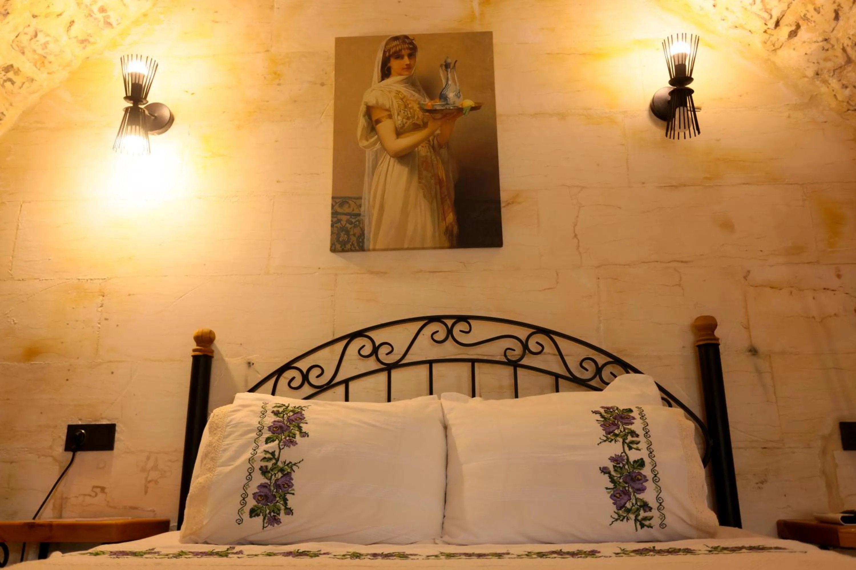 Bed in ASTARTE HOTEL