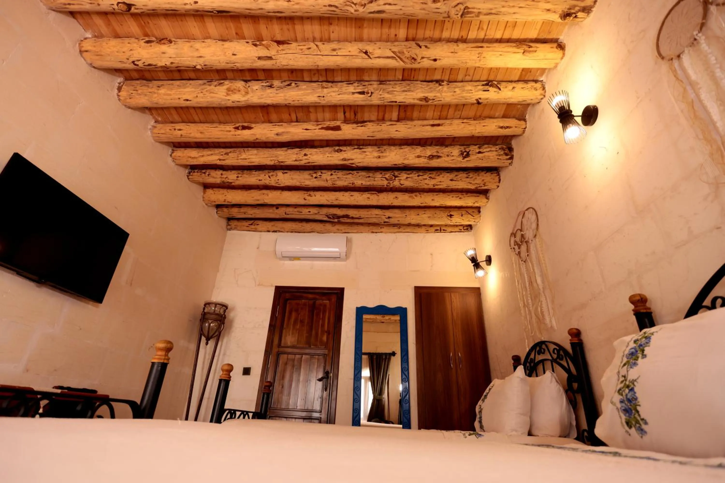 Bed in ASTARTE HOTEL