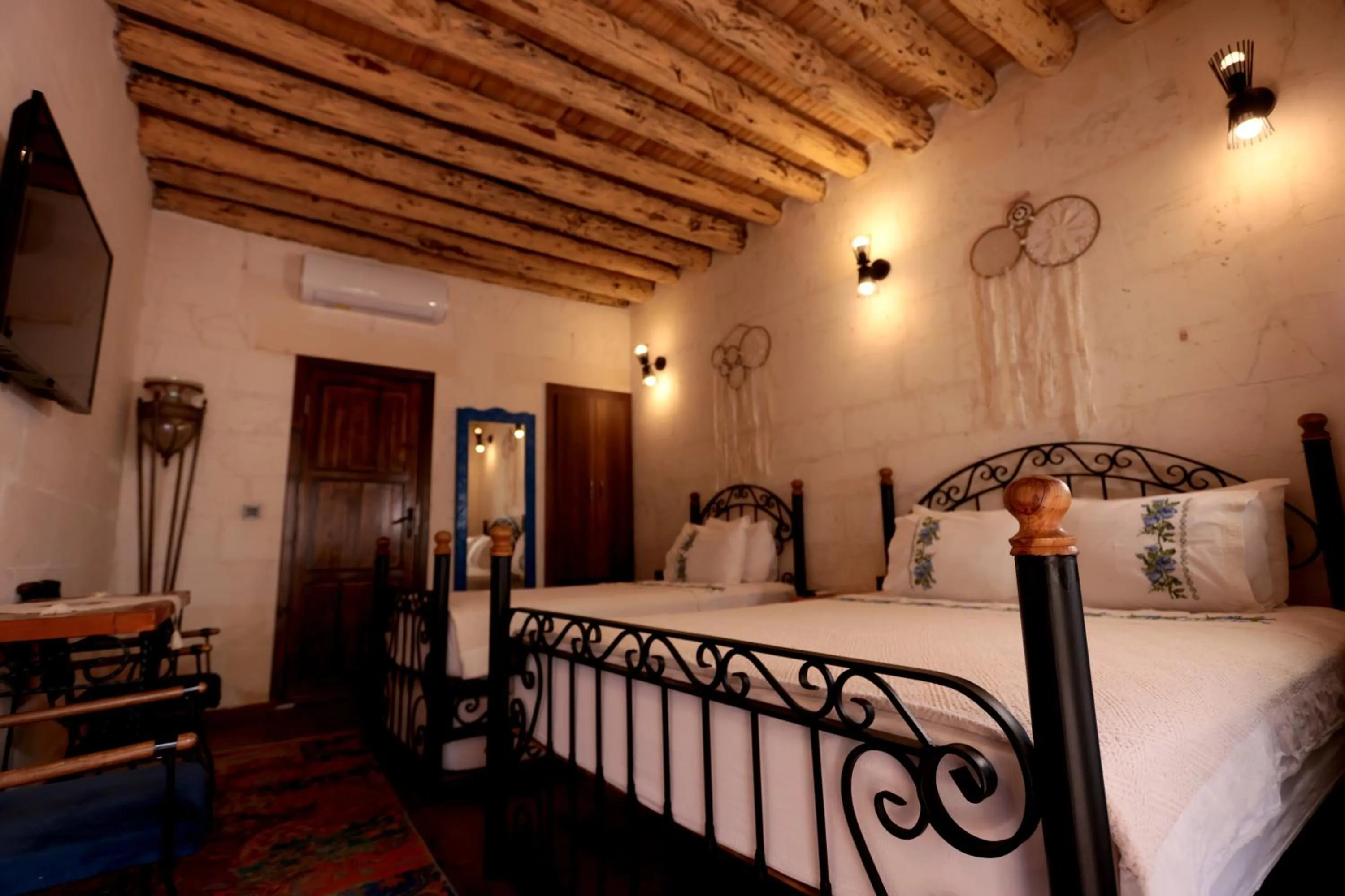 Bed in ASTARTE HOTEL