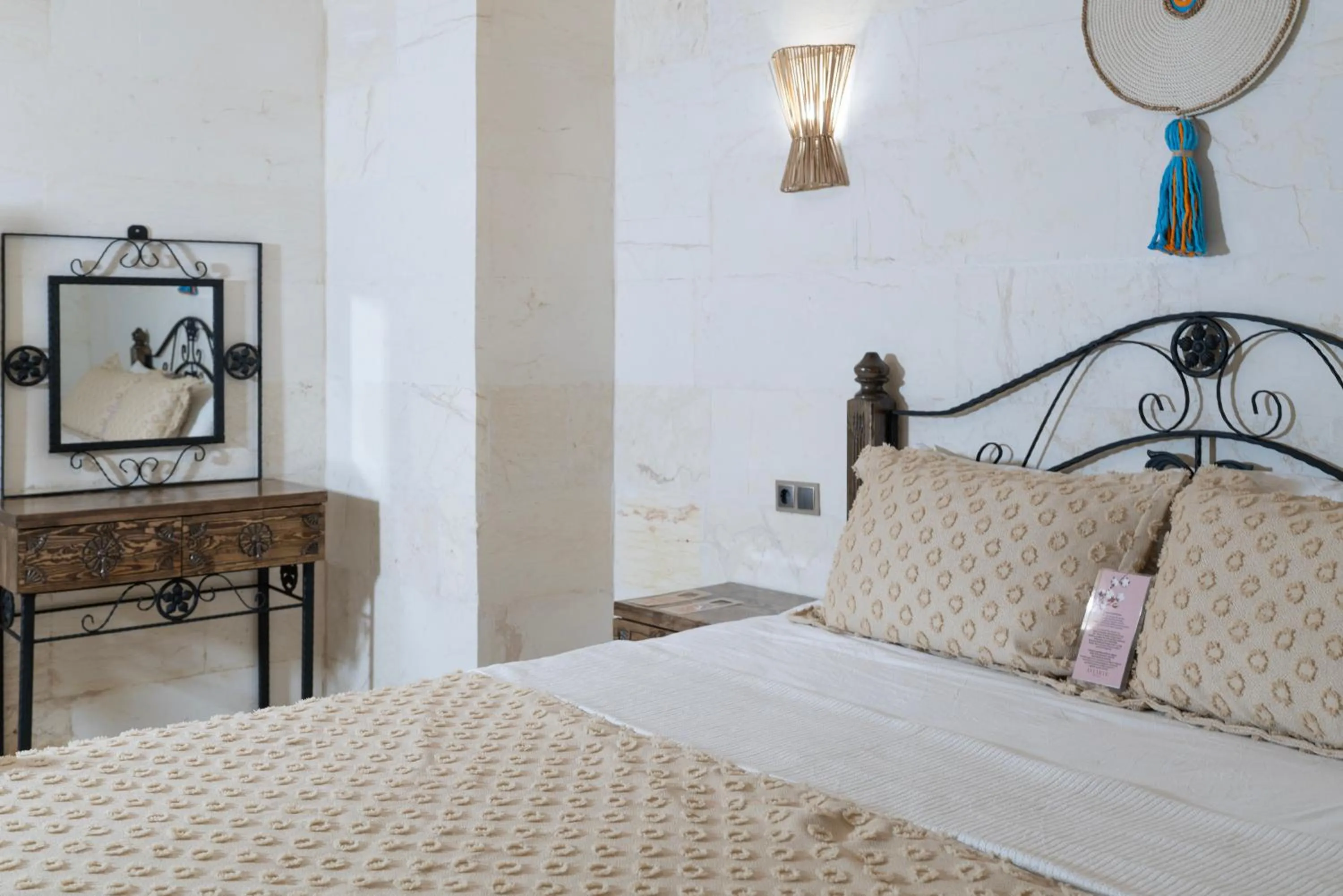 Bed in ASTARTE HOTEL