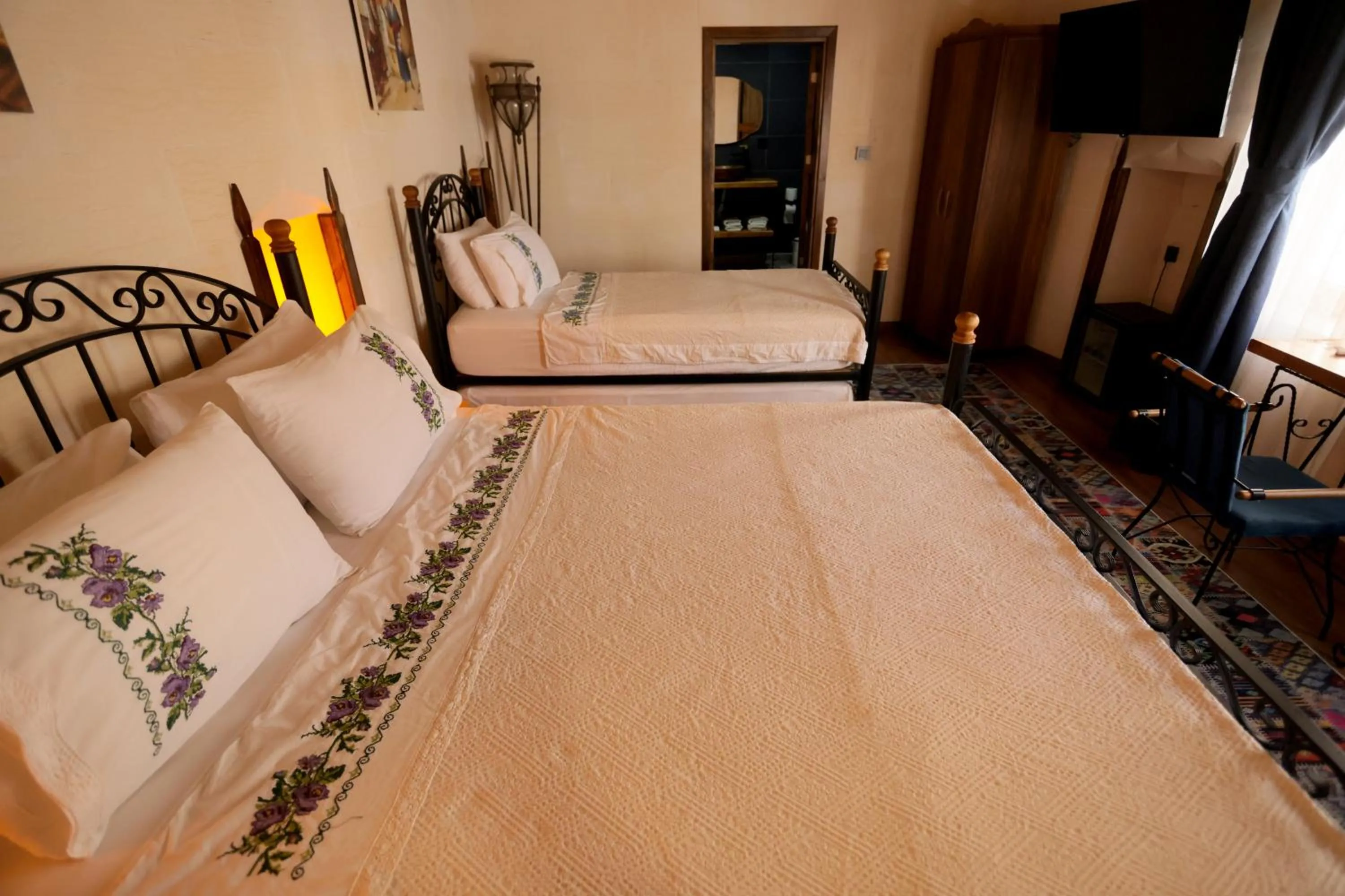 Bed in ASTARTE HOTEL