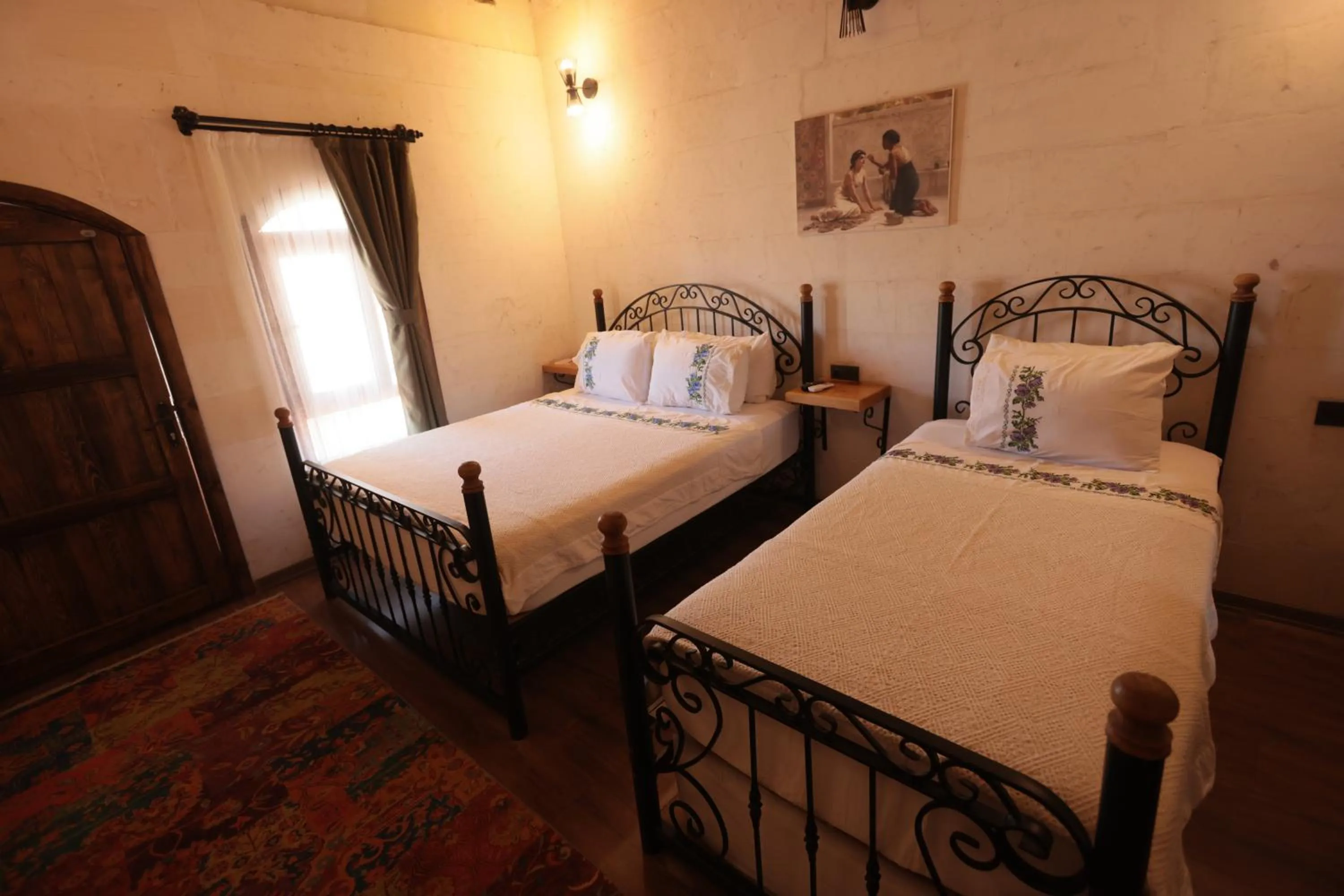 Bed in ASTARTE HOTEL