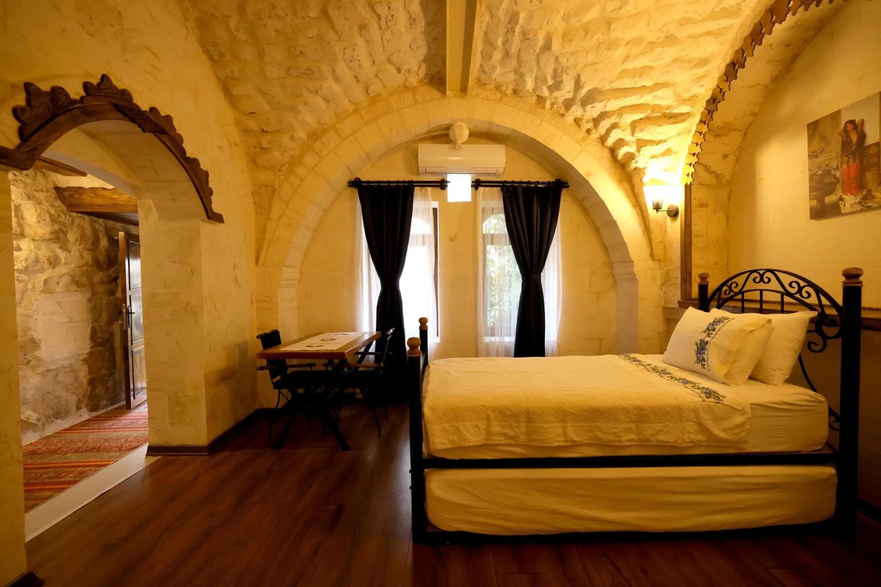 Bed in ASTARTE HOTEL