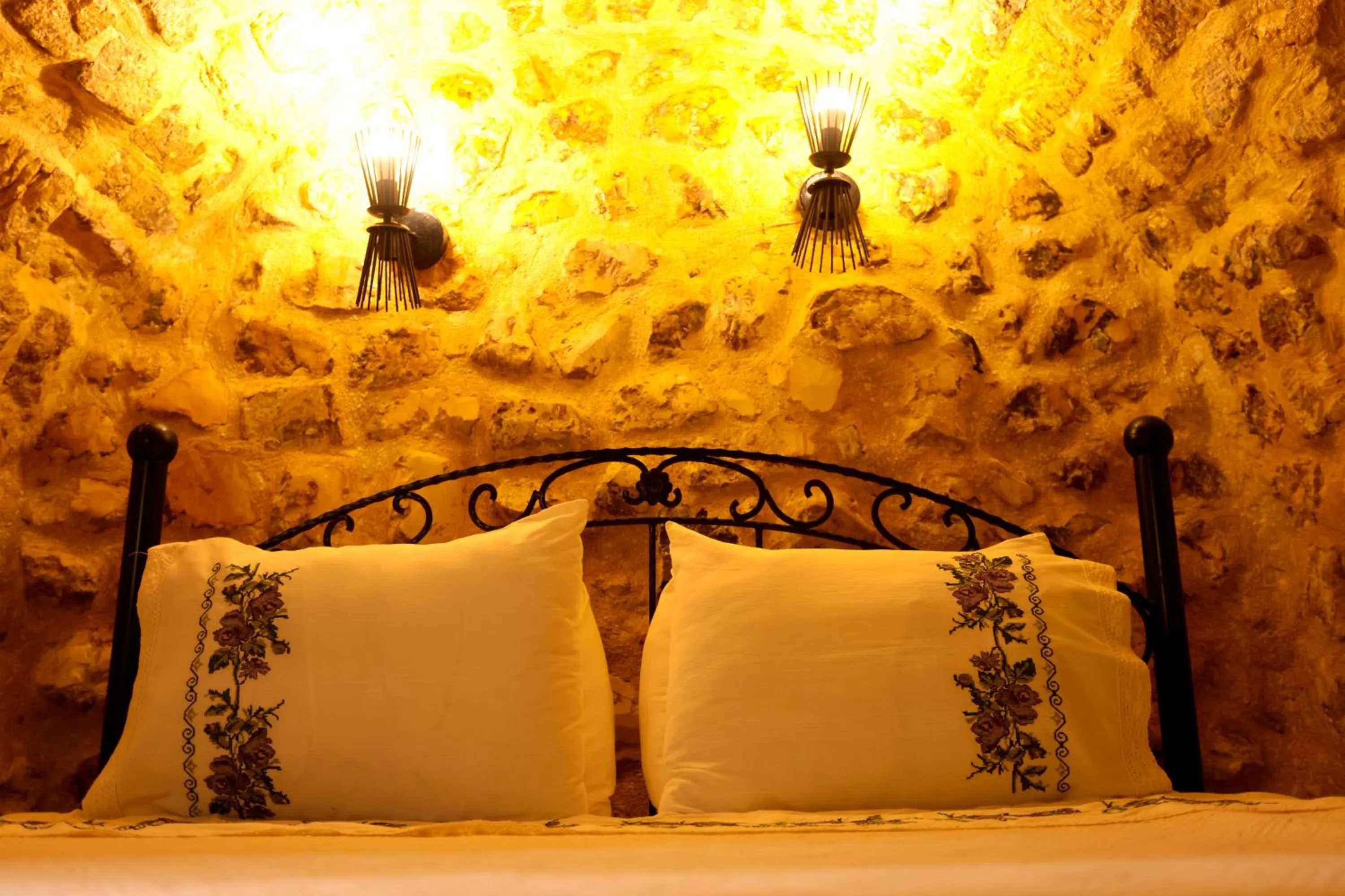 Bed in ASTARTE HOTEL