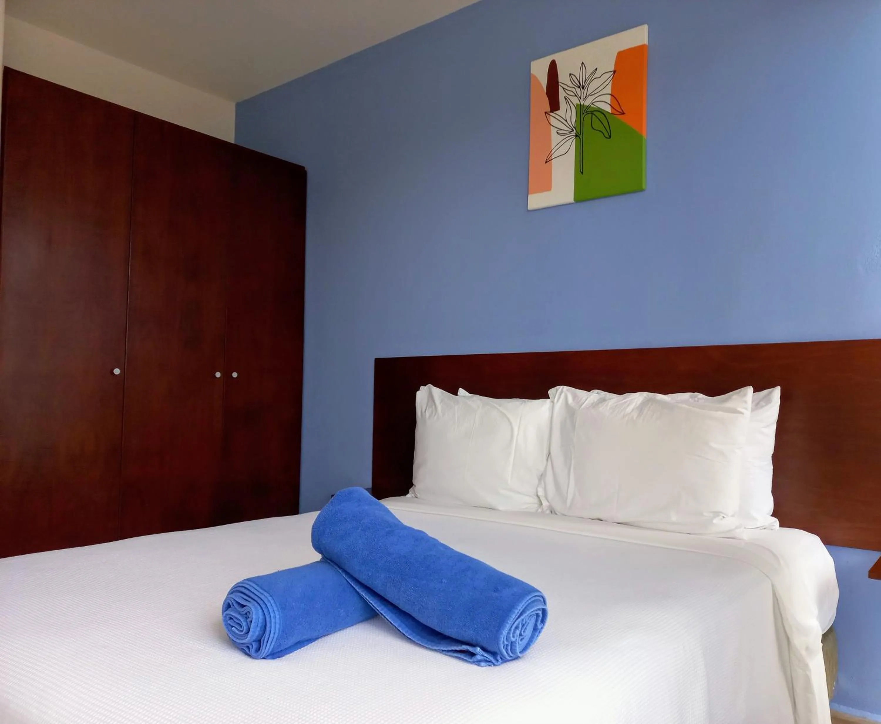 Bedroom, Bed in Cozy and spacious apartment by Tulum 10