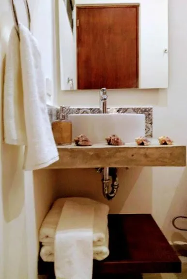 Bathroom in Cozy and spacious apartment by Tulum 10
