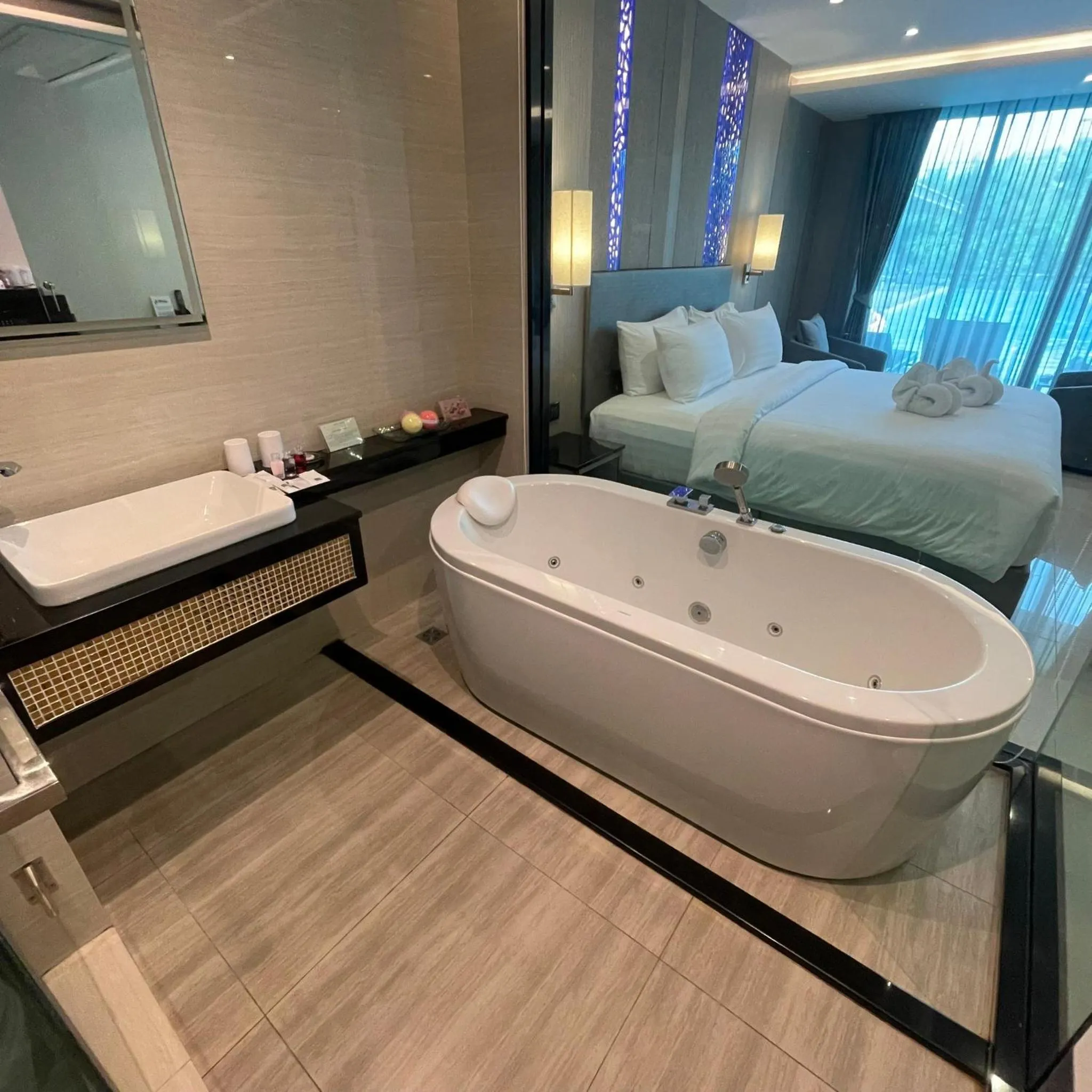 Bed in THE TJ HOTEL Pattaya