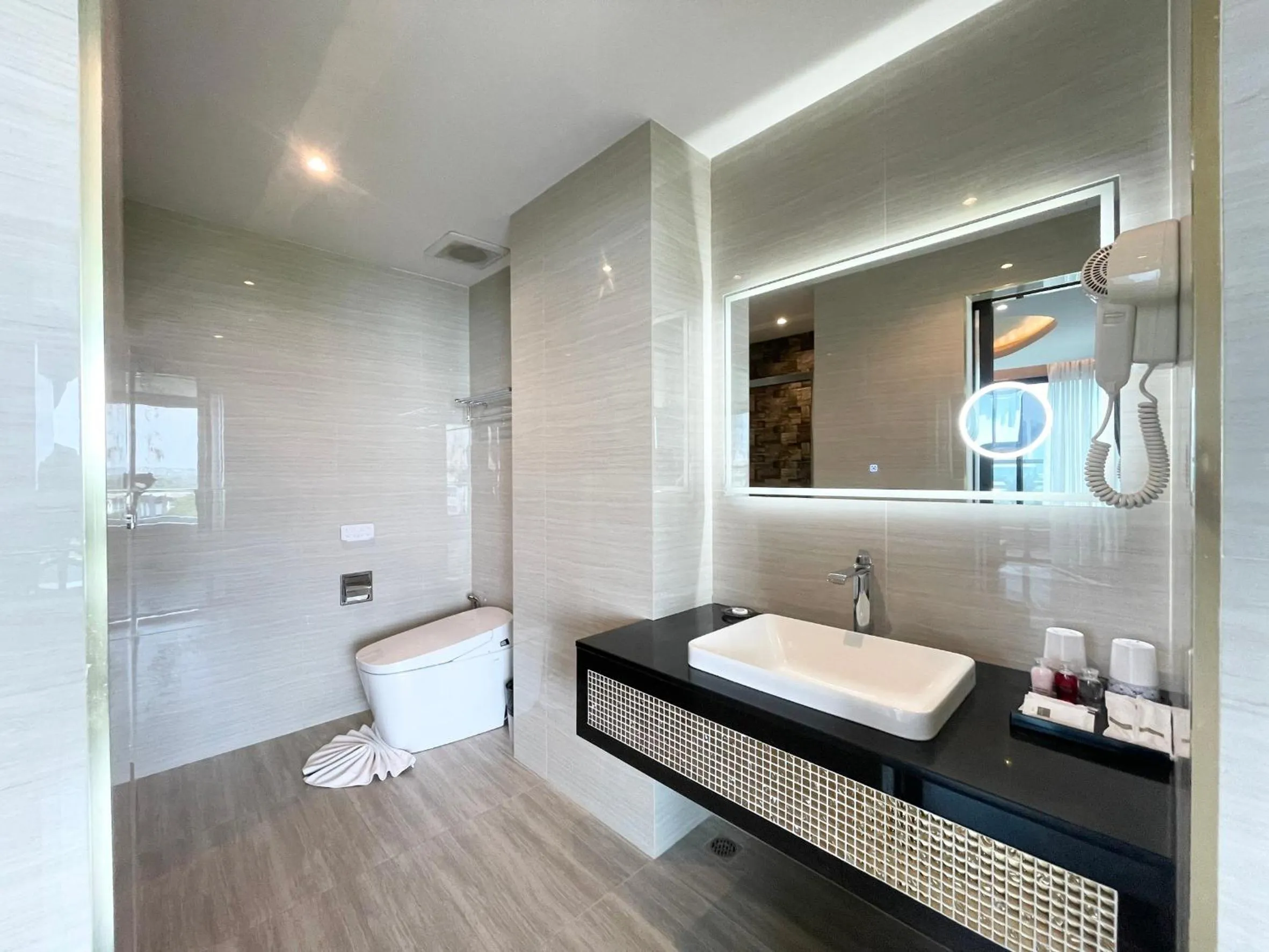 Shower in THE TJ HOTEL Pattaya