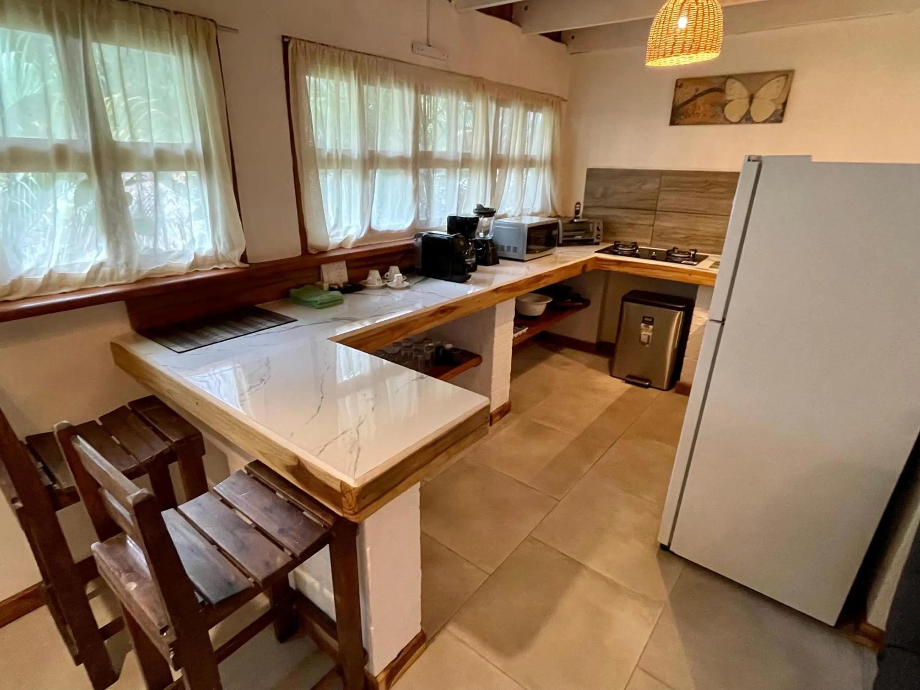 Kitchen or kitchenette in Hotel El Manglar y Cantarana