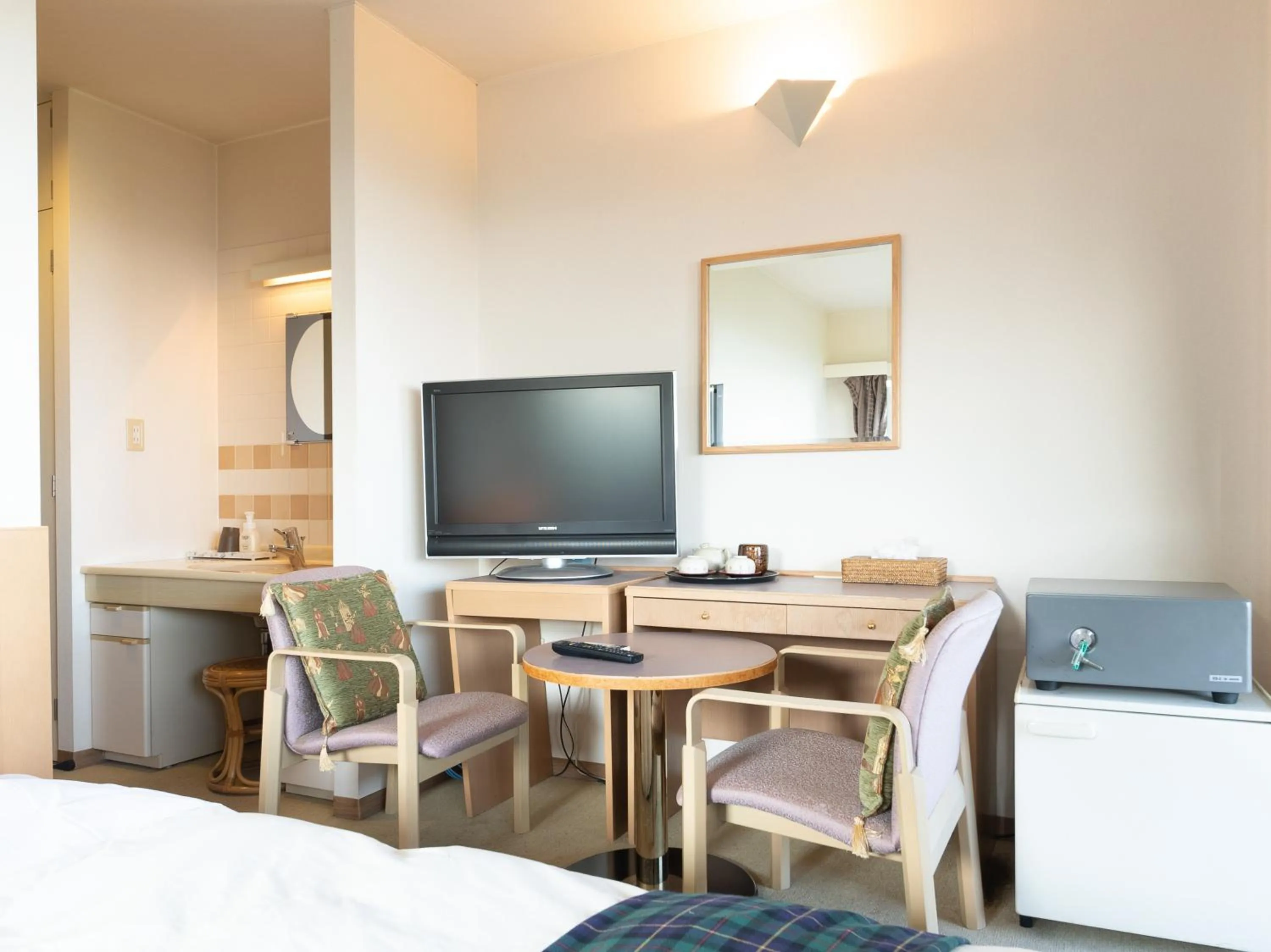 Bed in Tabist Hotel Iyashi no Sato