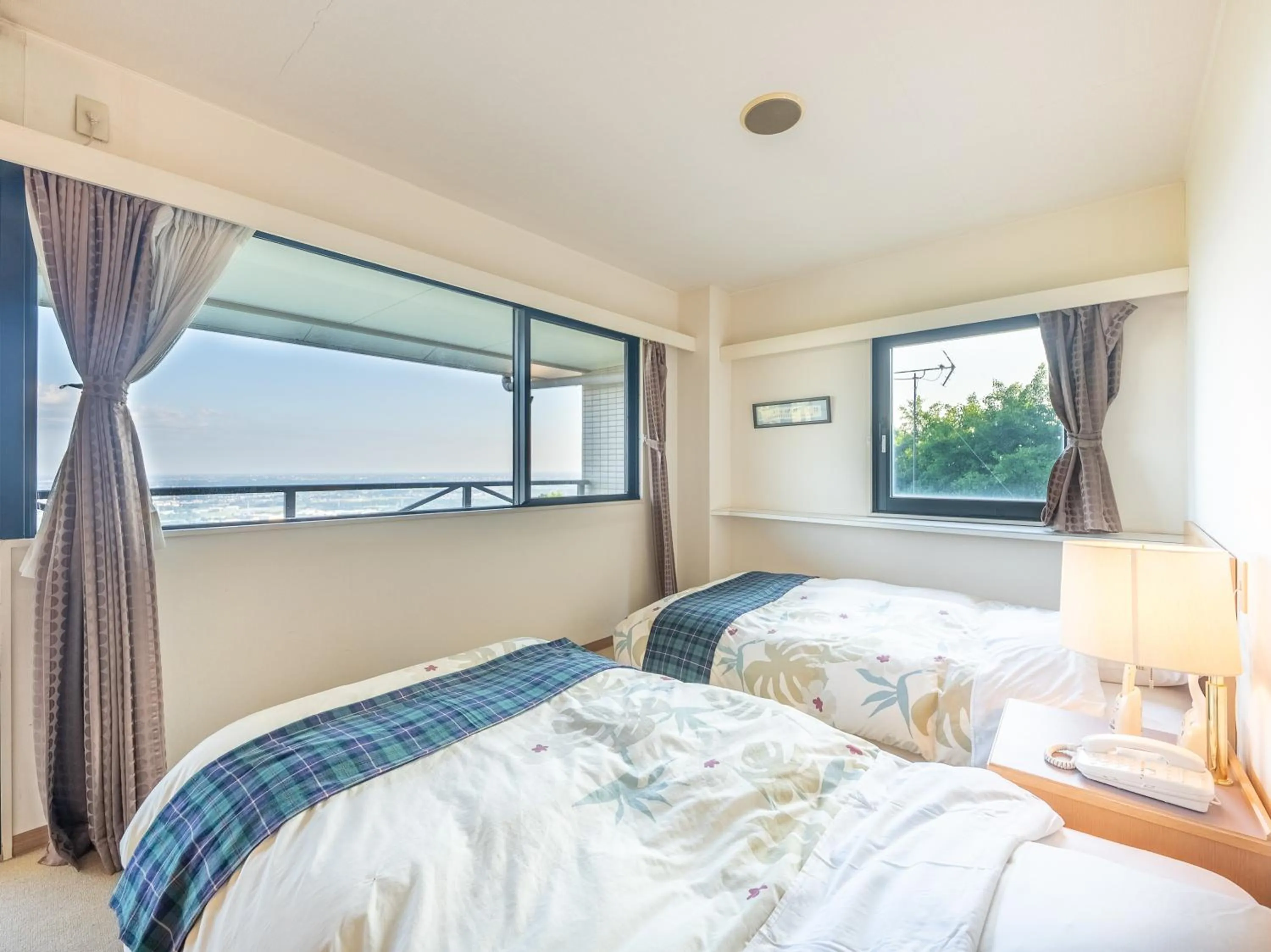 Bed in Tabist Hotel Iyashi no Sato